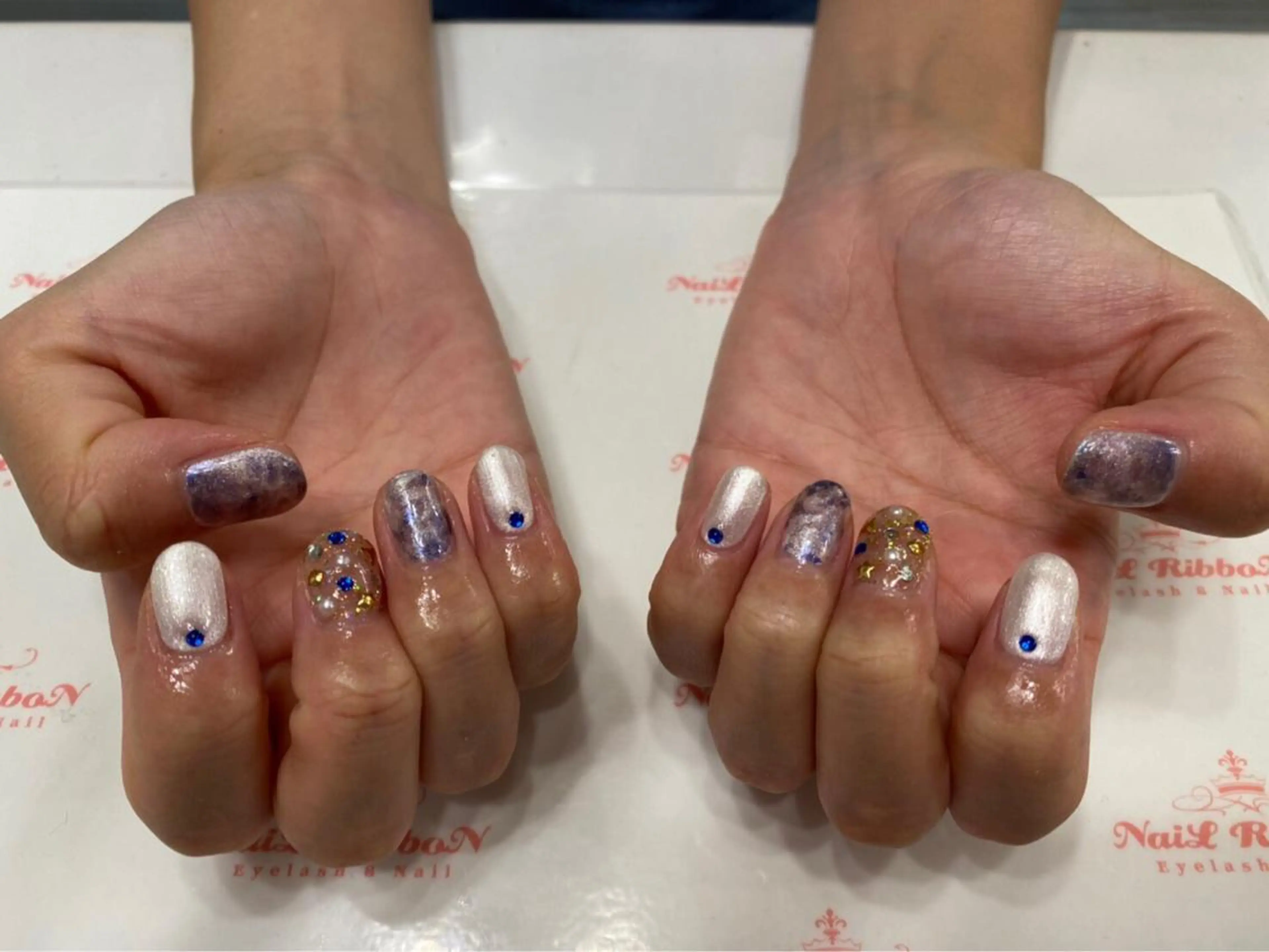 ネイル 春ネイル ネイルリボン 受付スタッフのネイルデザイン