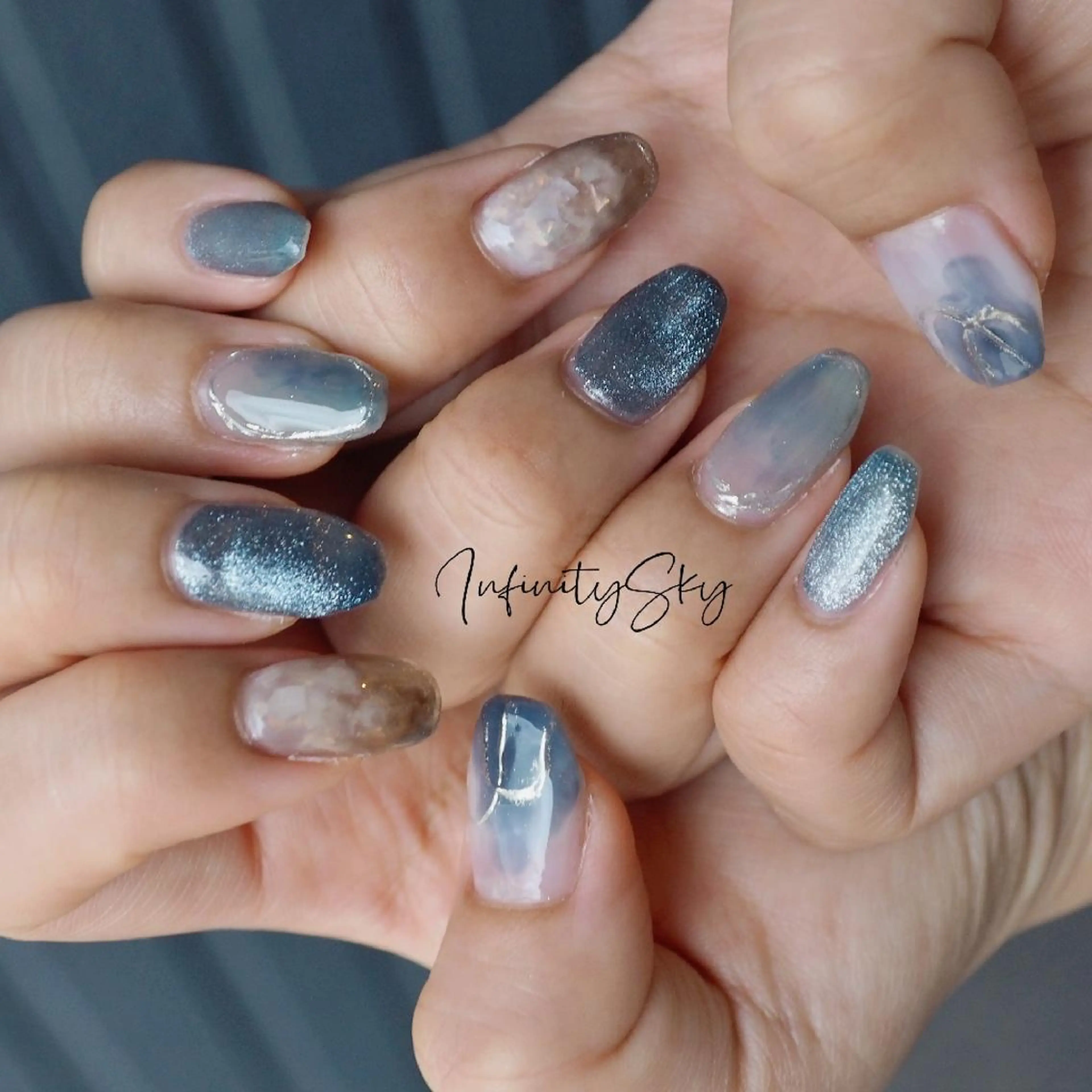 ネイル ブルー ニュアンスネイル infinity skyのネイルデザイン