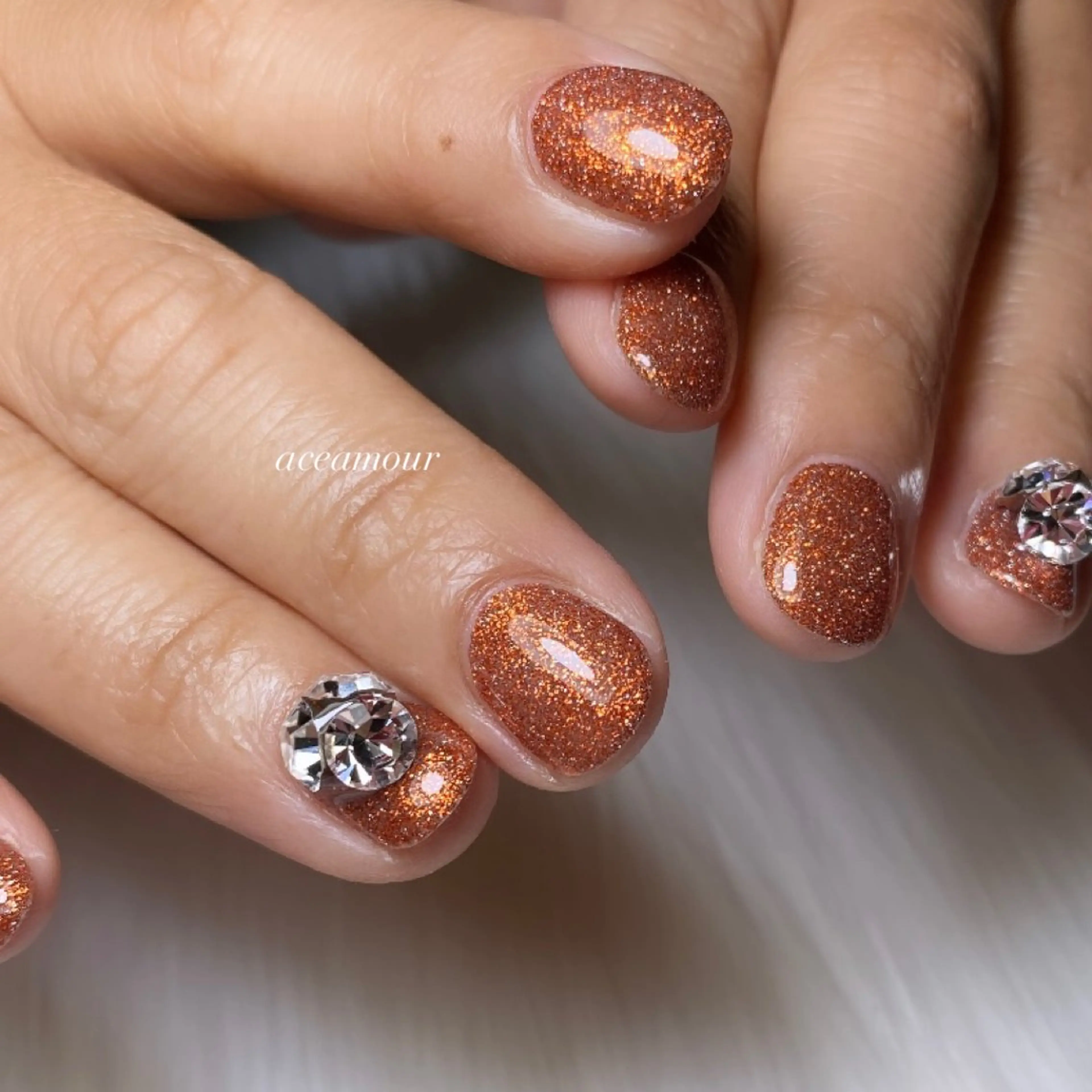 ネイル クリアネイル ラメ(グリッター) オレンジ ネイル/耳つぼ /新ホワイトニングのネイルデザイン