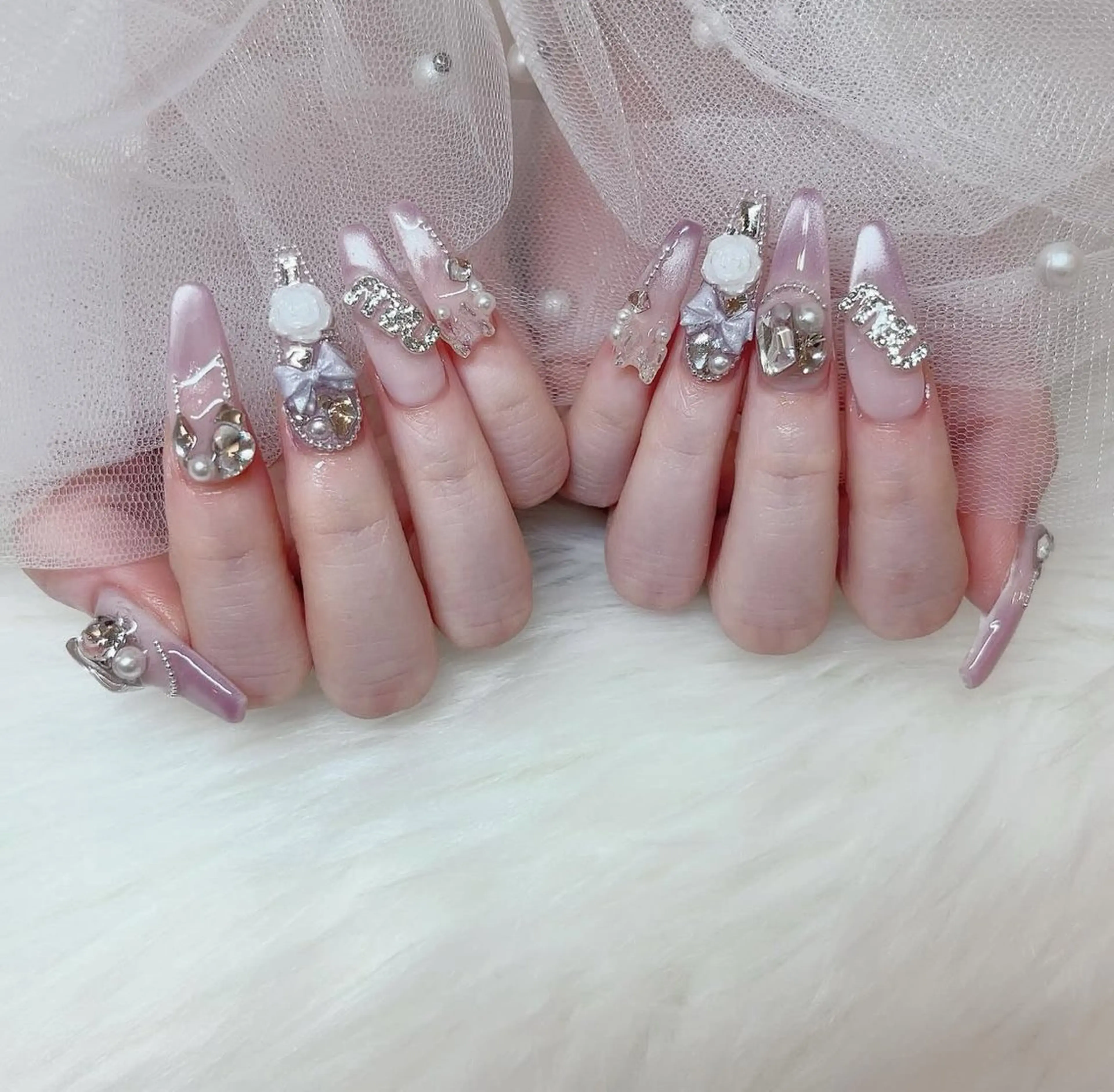 ネイル 成人式 ロングネイル マグネットネイル 大理石ネイル(マーブル) リボン ハンドネイル LilyLala Nailsalonのネイルデザイン
