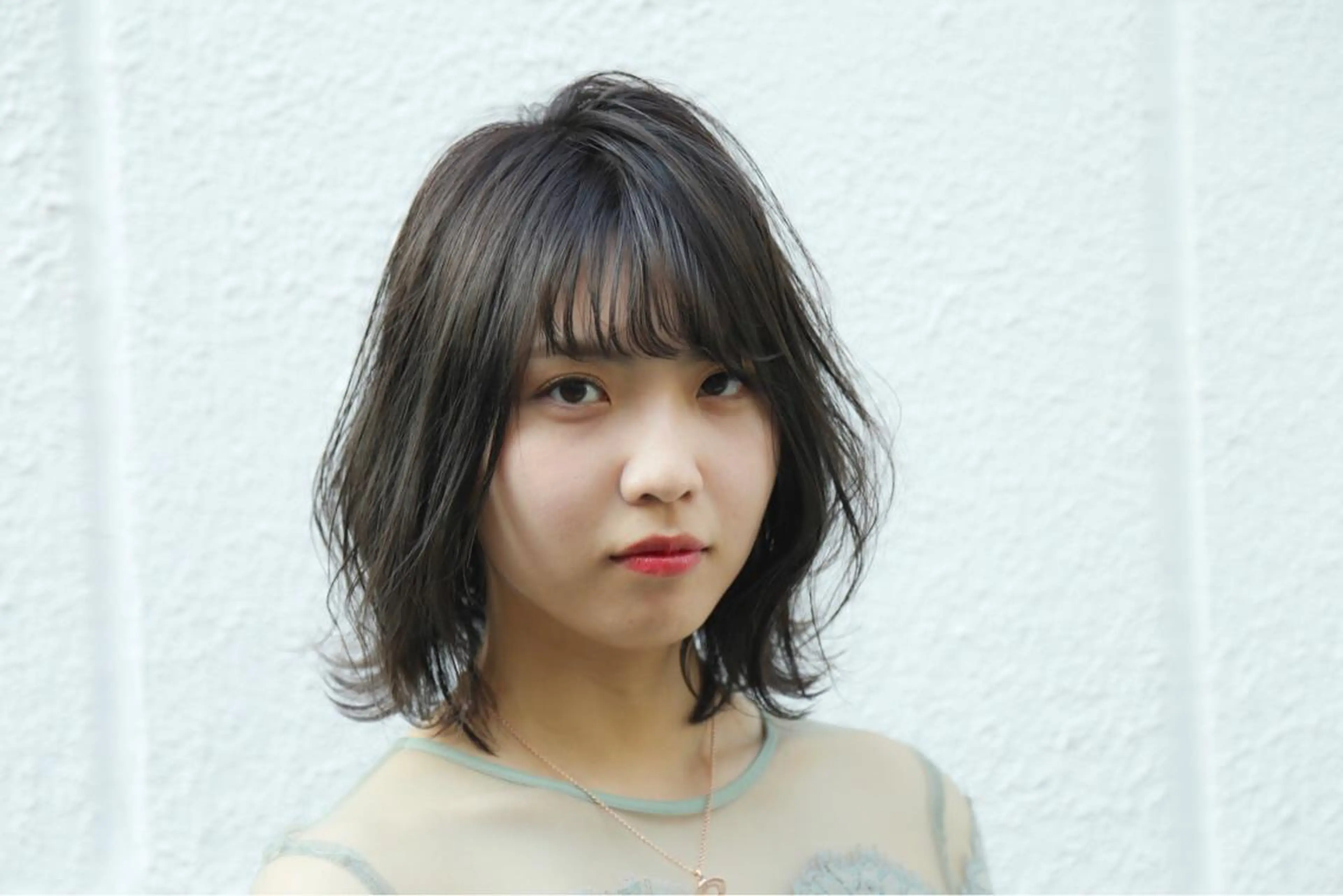 ミディアム ボブ オーストヘアージジ所属・TAI透明カラー 柔らかい縮毛矯正のヘアスタイル