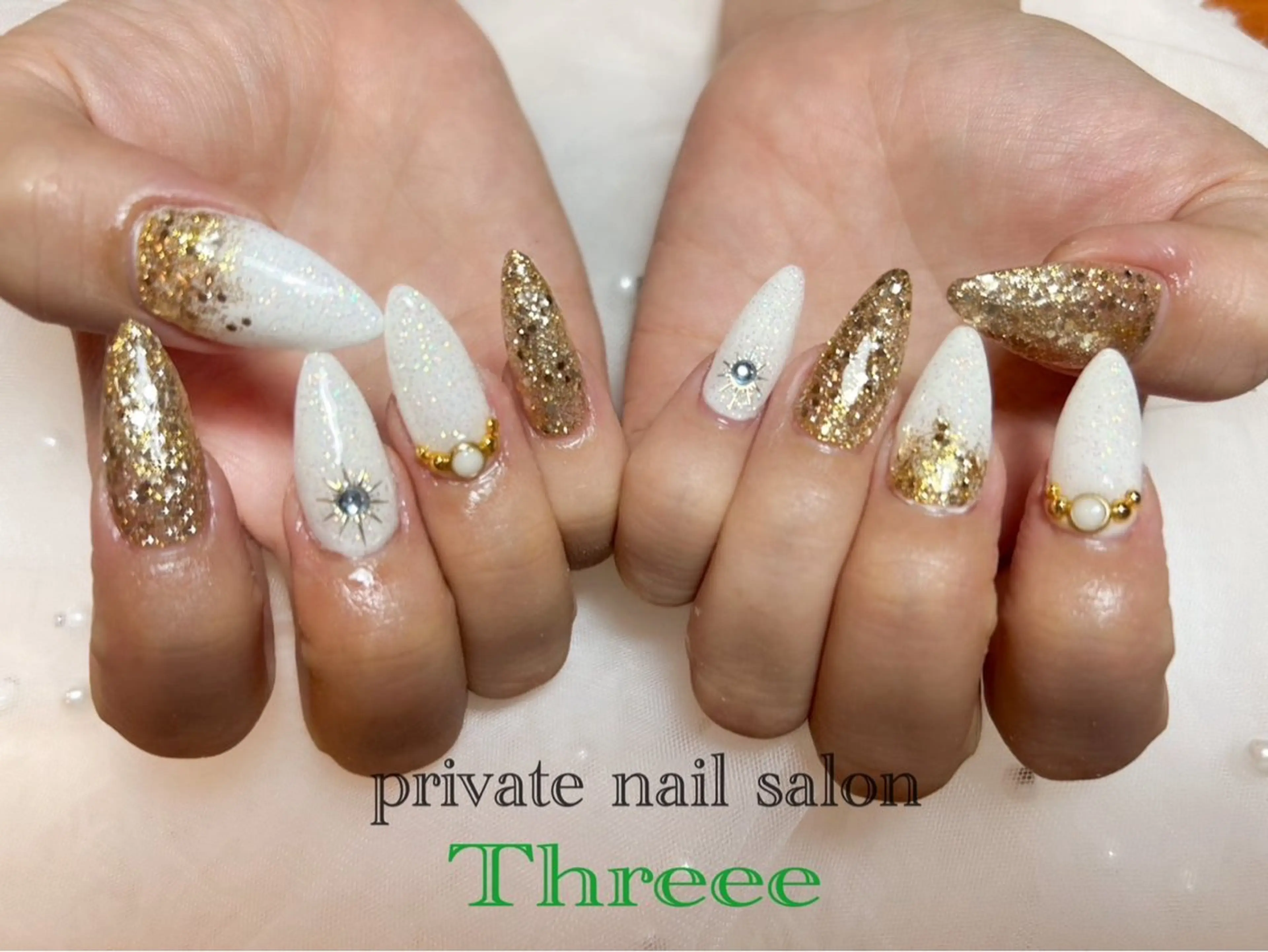 ネイル 長さ出し キラキラネイル ハンドネイル Nail salon - Threee　-のネイルデザイン