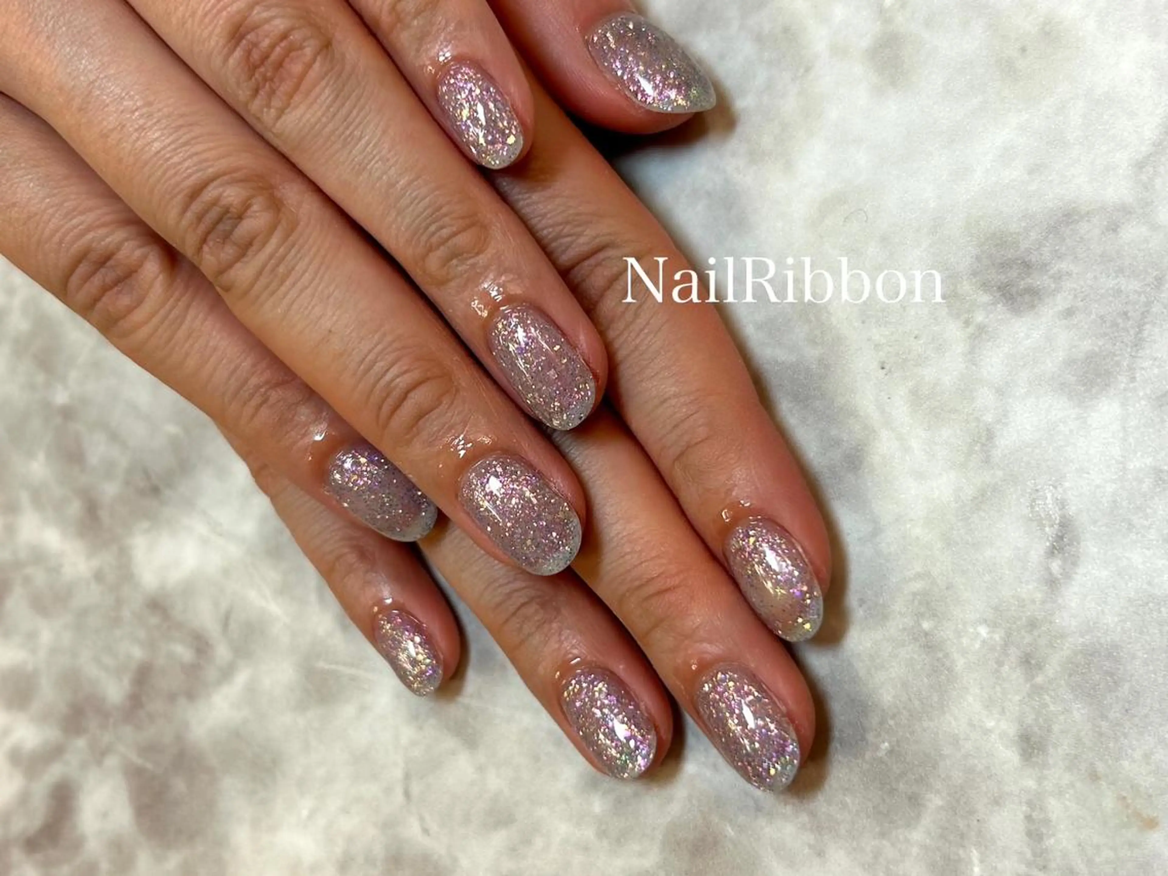 ネイル ネイルリボン 受付スタッフのネイルデザイン