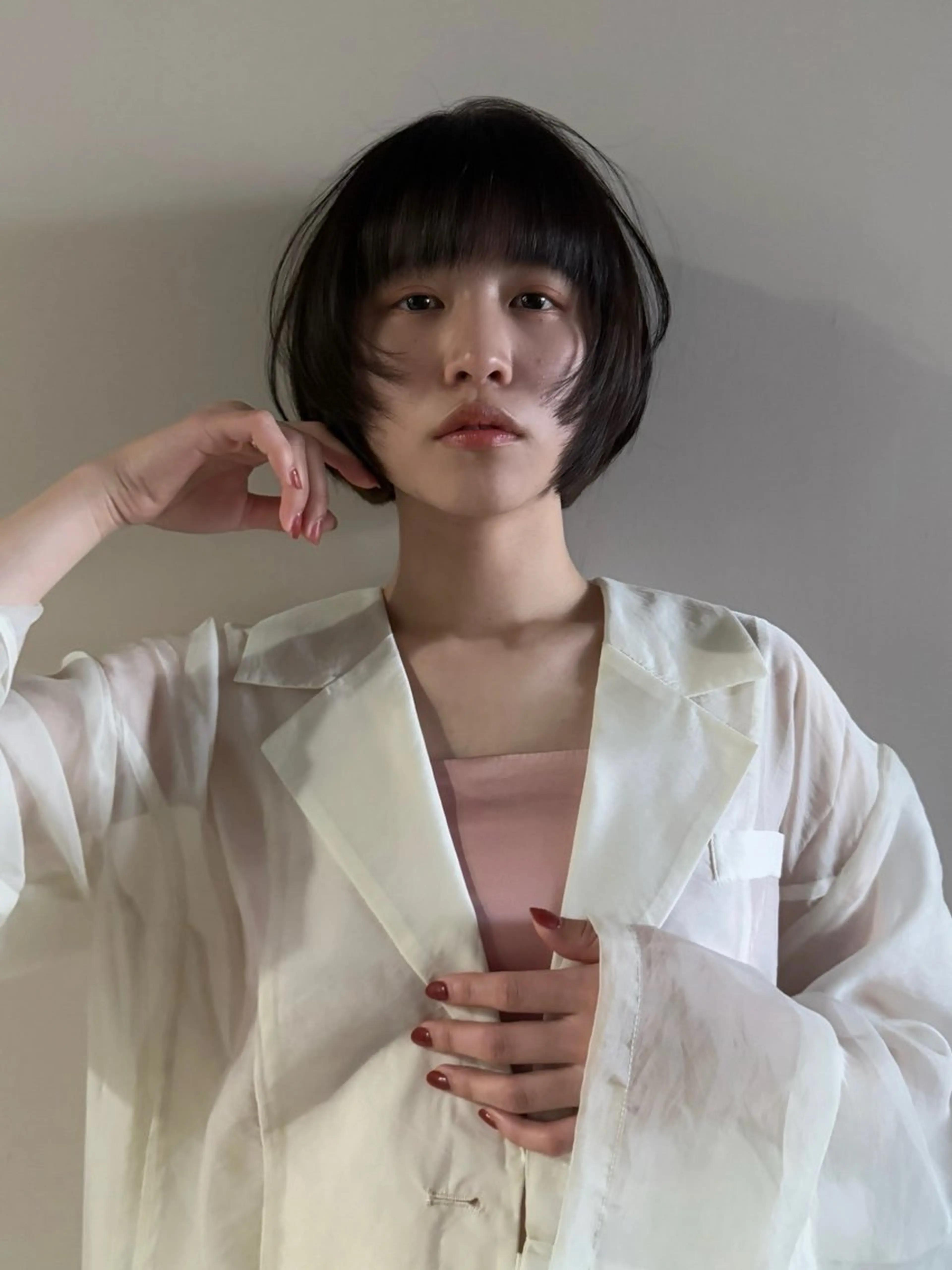 ショート ボブ 顔周りカット n i r .所属・渡部 円のヘアスタイル