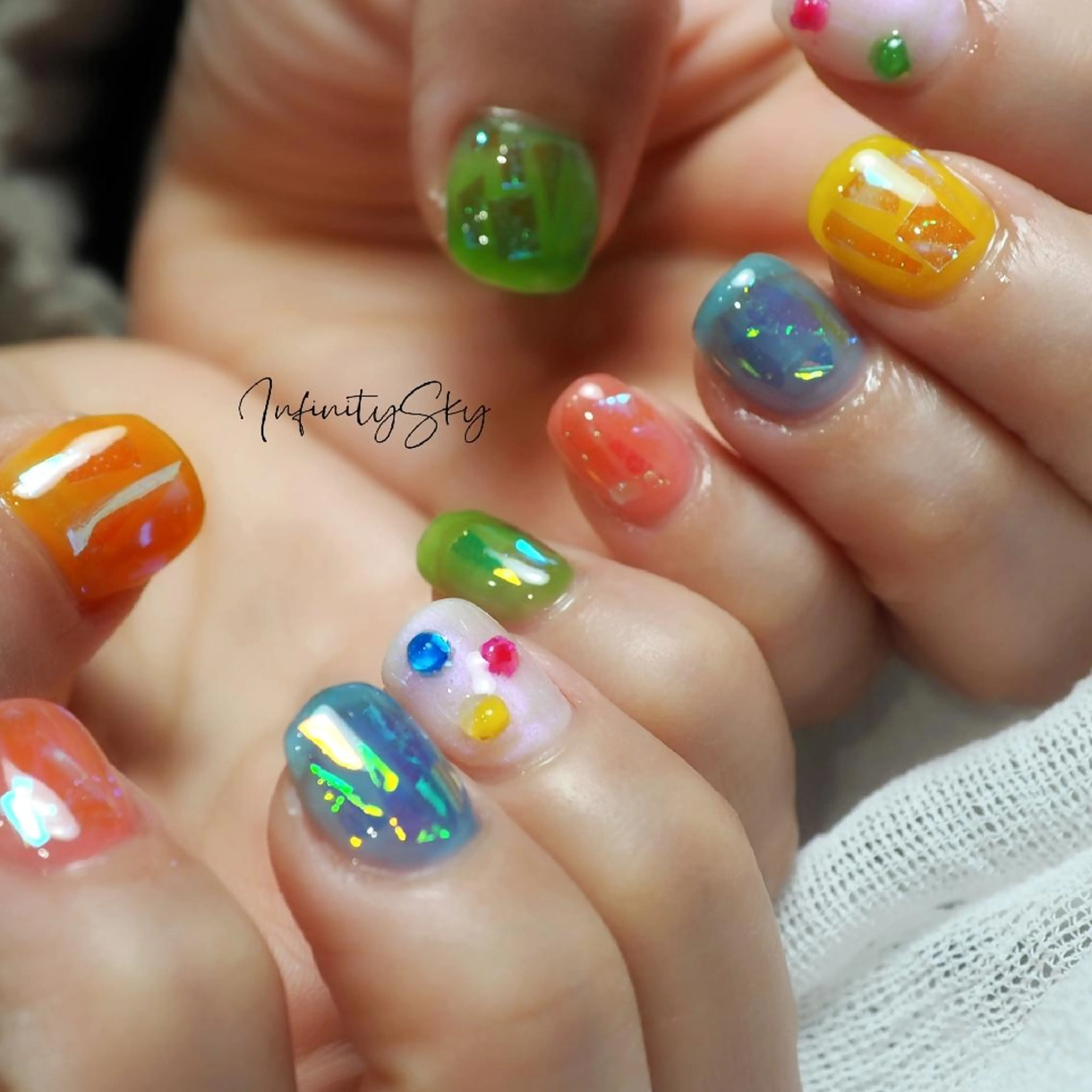 ネイル オーロラネイル キラキラネイル infinity skyのネイルデザイン