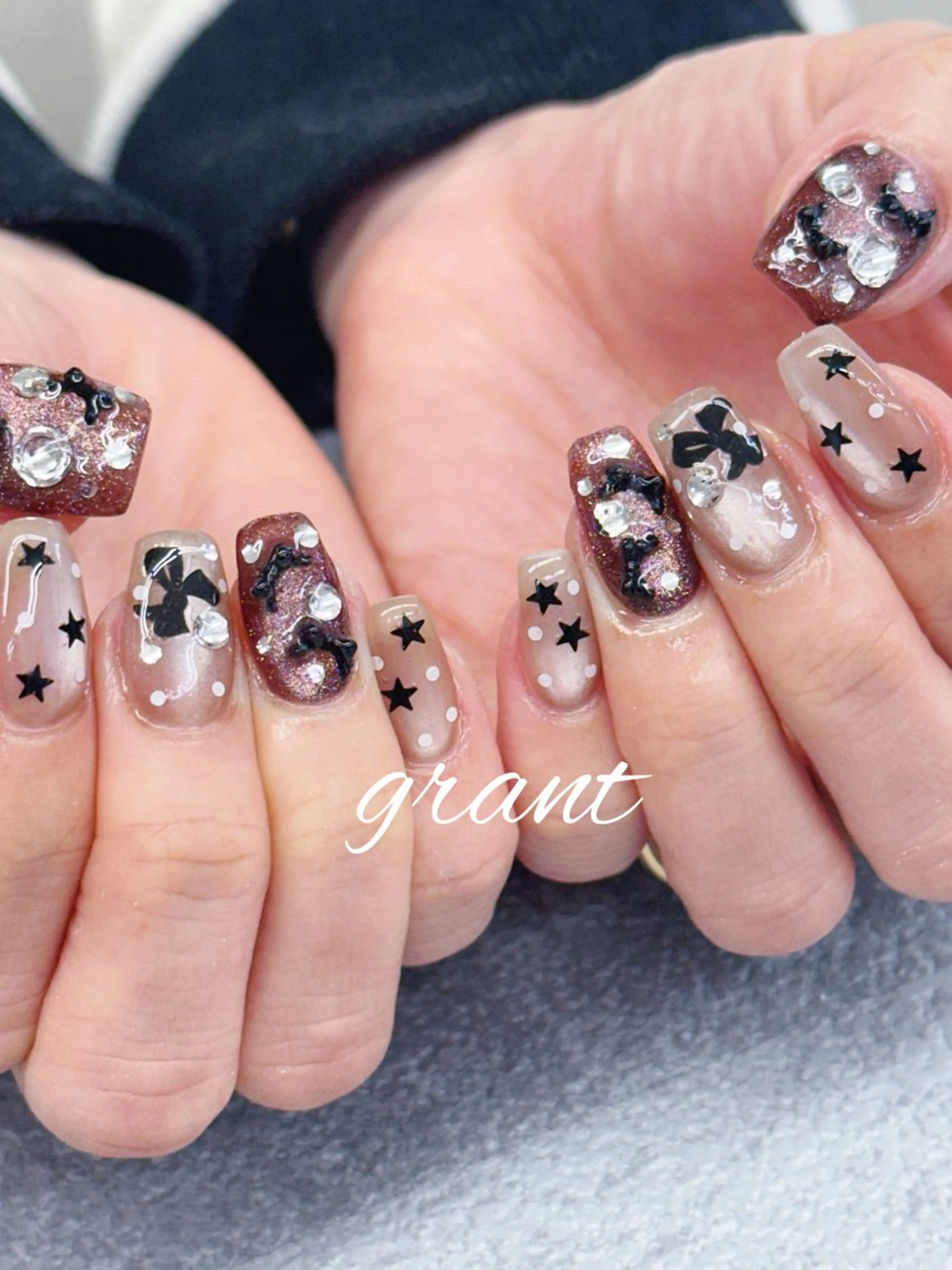 ネイル マグネットネイル リボン ハンドネイル nail salon grant所属・nailsalon grantのネイルデザイン