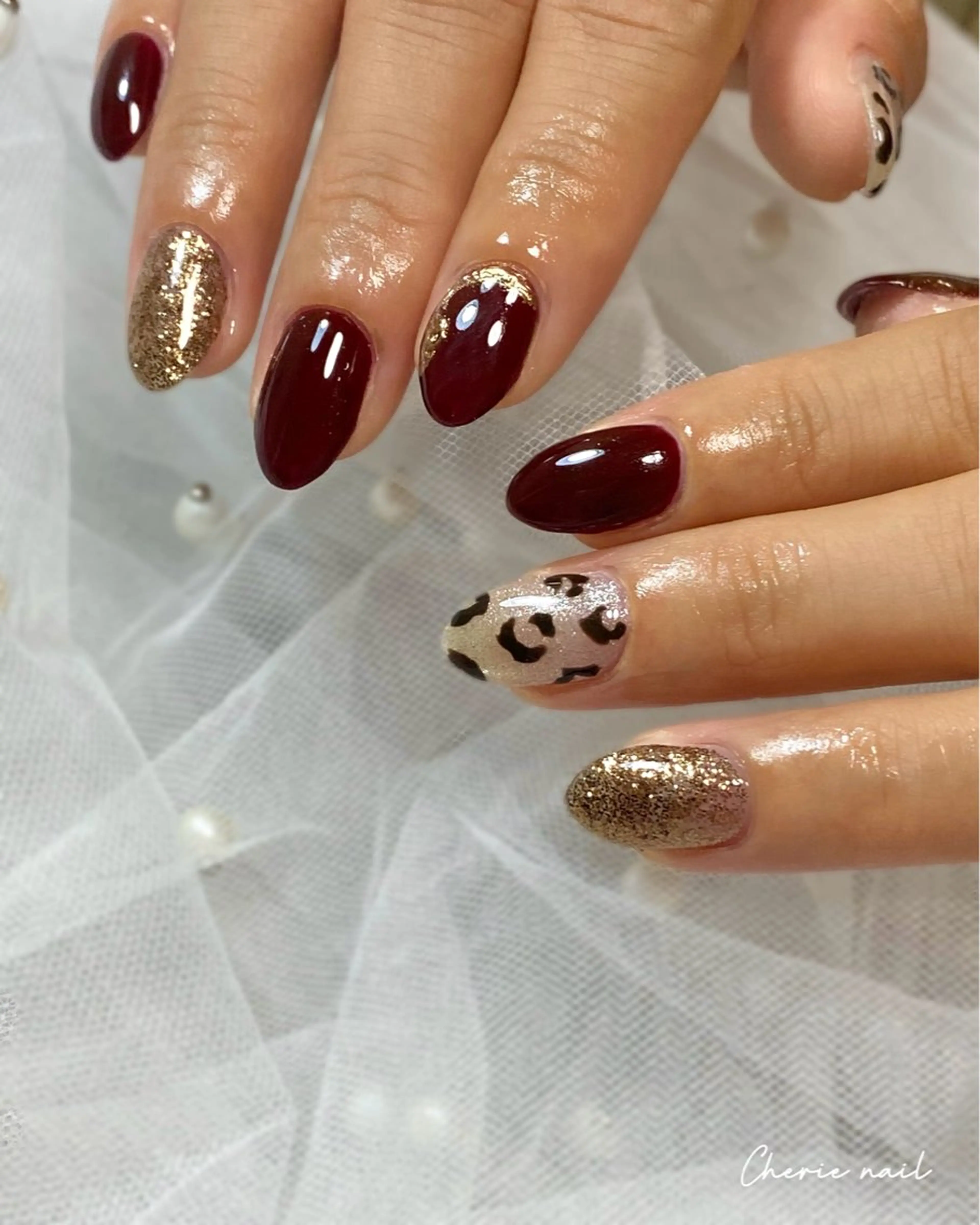 ネイル アニマル柄 ボルドー ジェルネイル ラメ(グリッター) ハンドネイル Cherienail yunaのネイルデザイン