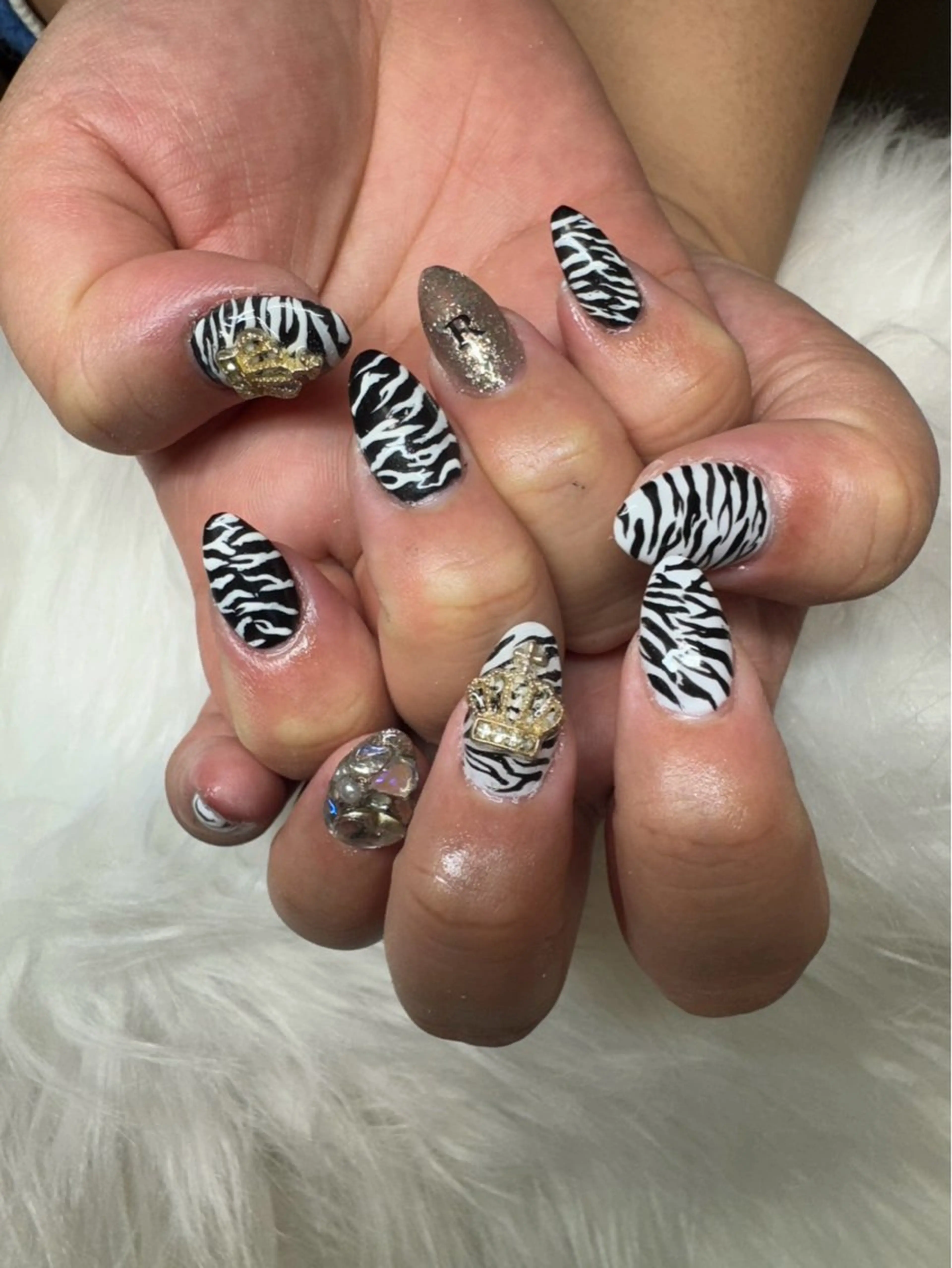 ネイル アニマル柄 ゴールド Malo nailのネイルデザイン
