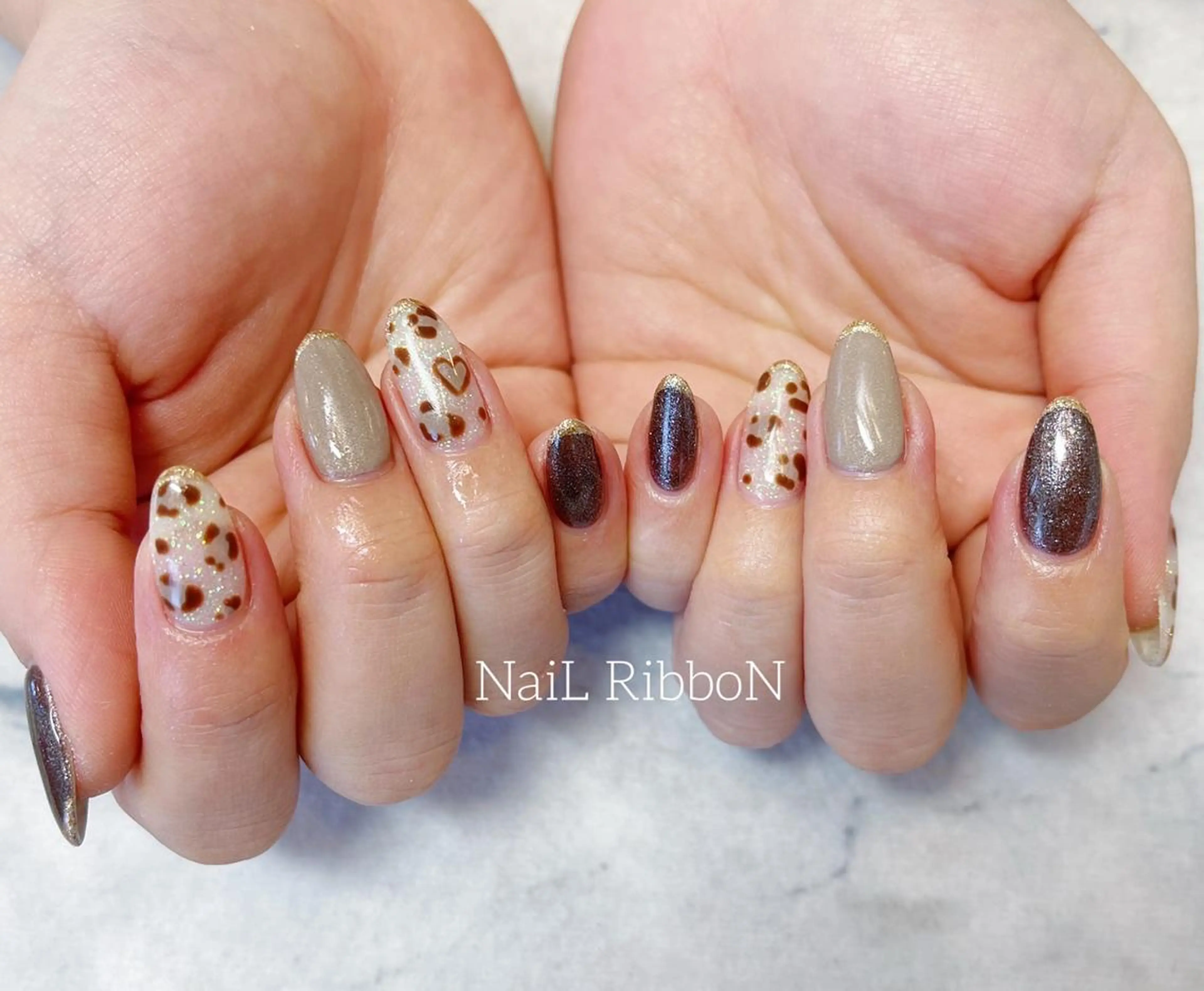 ネイル ネイルリボン 受付スタッフのネイルデザイン