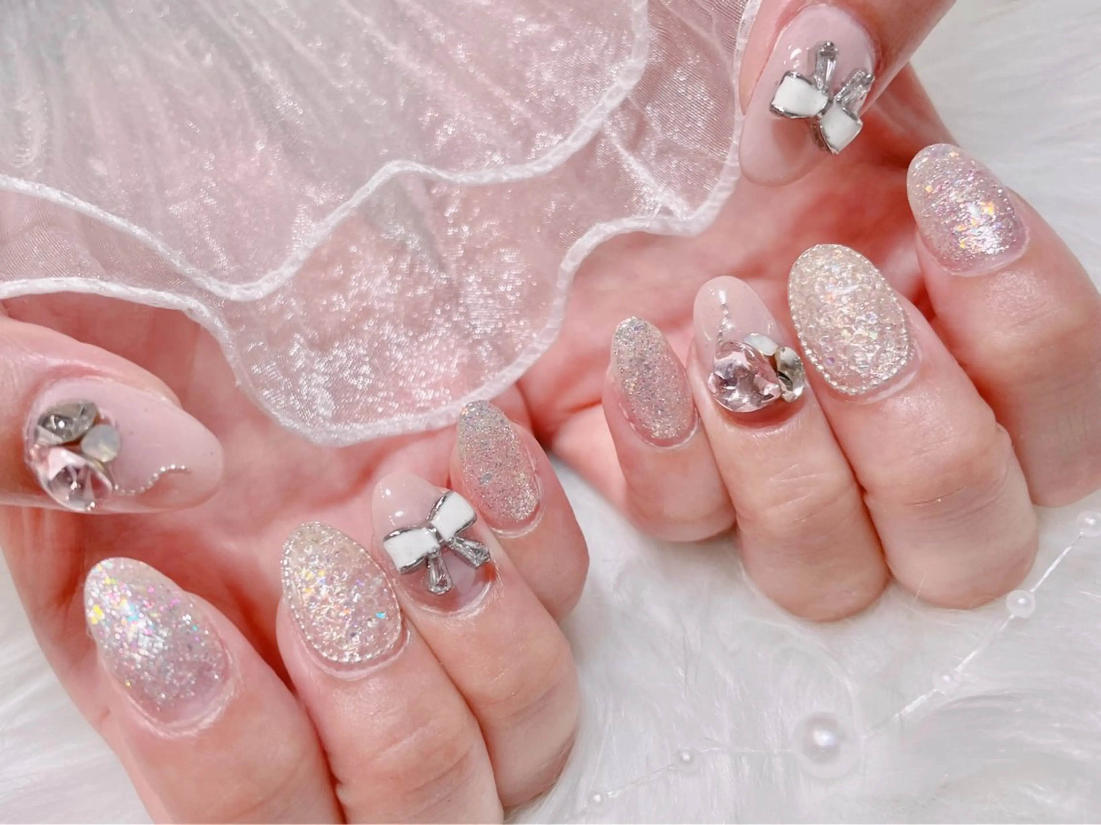 ネイル キラキラネイル リボン ワンホンネイル ハンドネイル ゆりか ジョアアンジェ福島のネイルデザイン