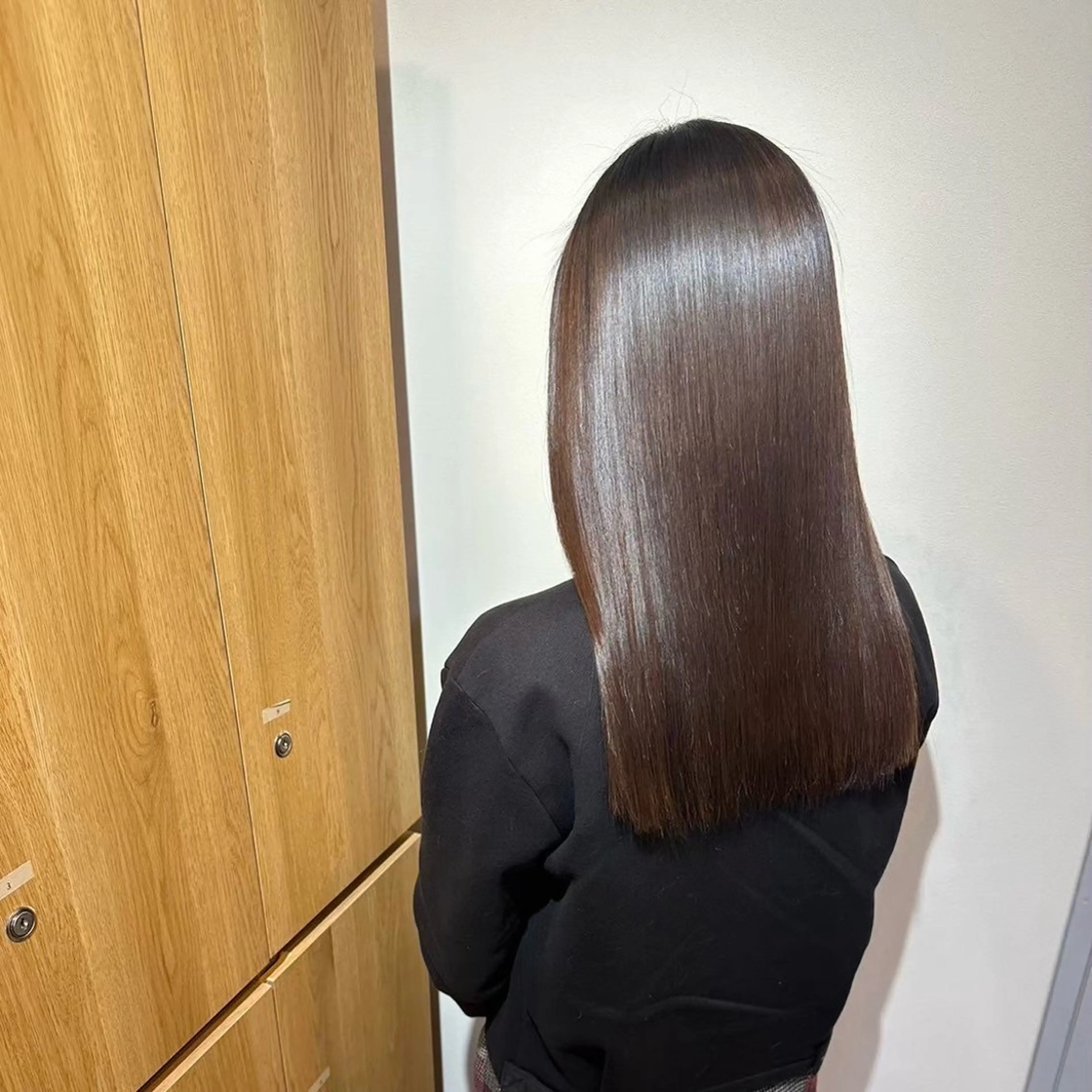 ロング 岡田 佳子のヘアスタイル