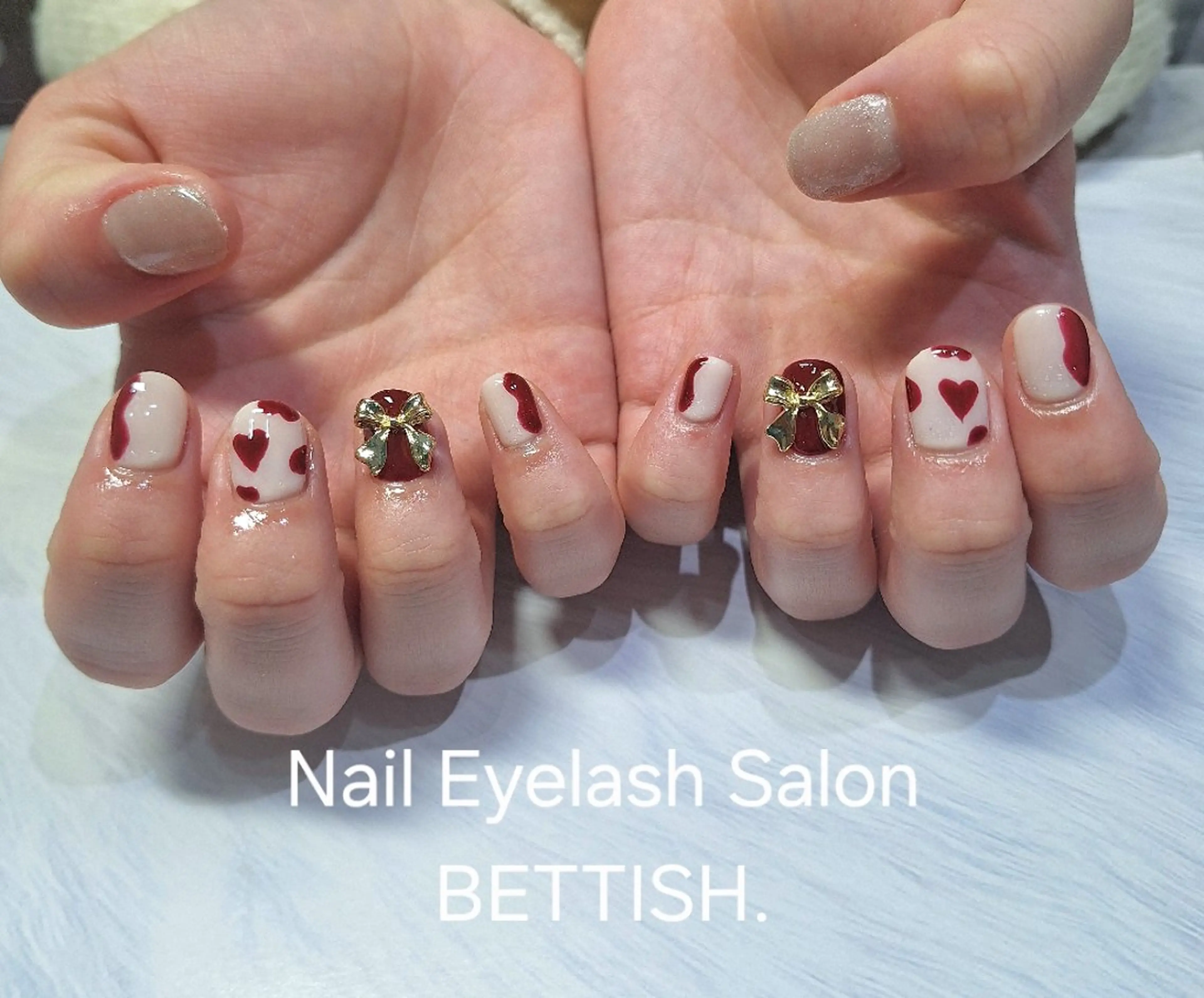 ネイル リボン 冬ネイル クリスマス ハンドネイル BETTISH　 　AIRIのネイルデザイン