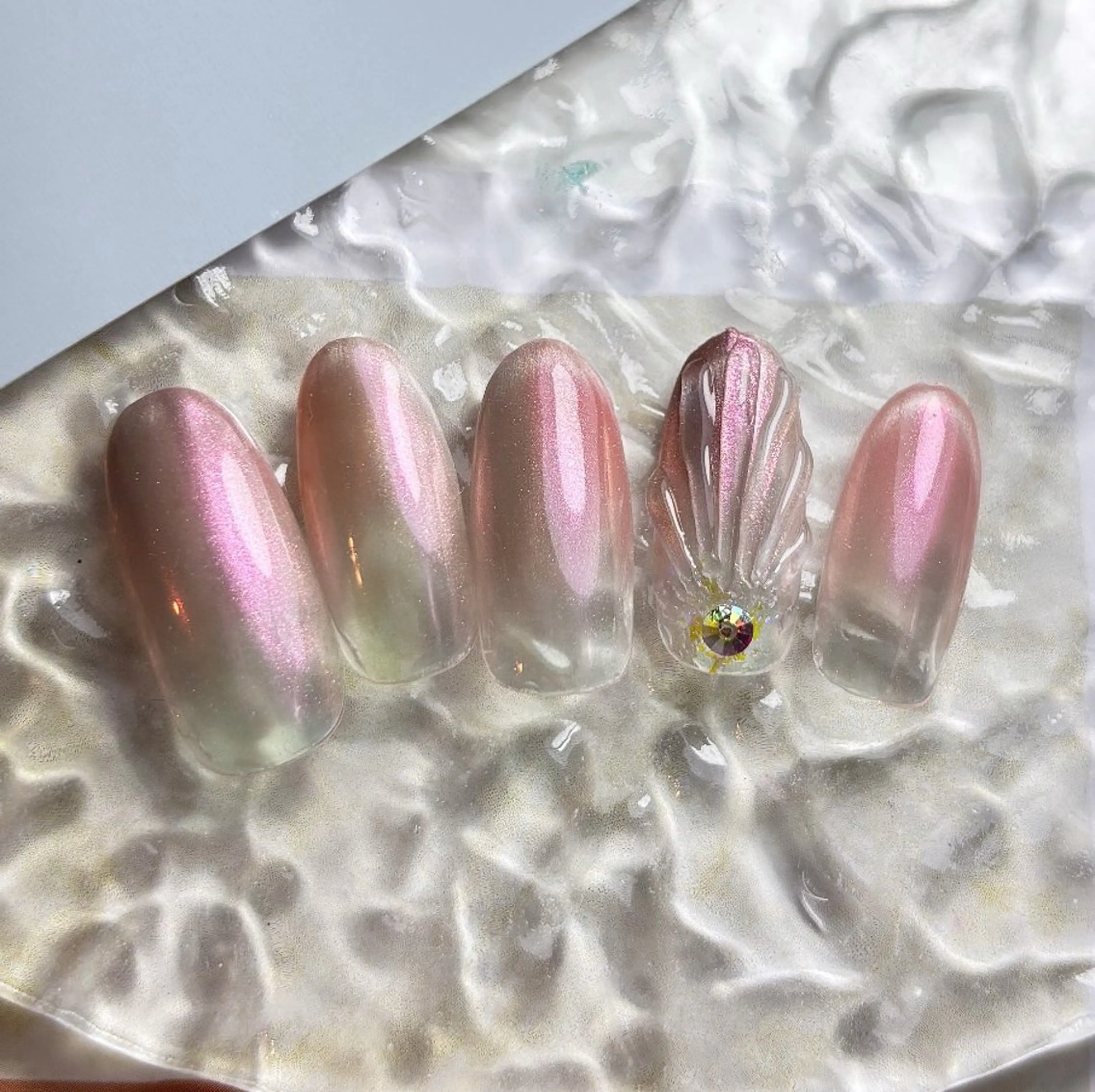 ネイル 氷ネイル・うるうるネイル ピンク MKY salonのネイルデザイン