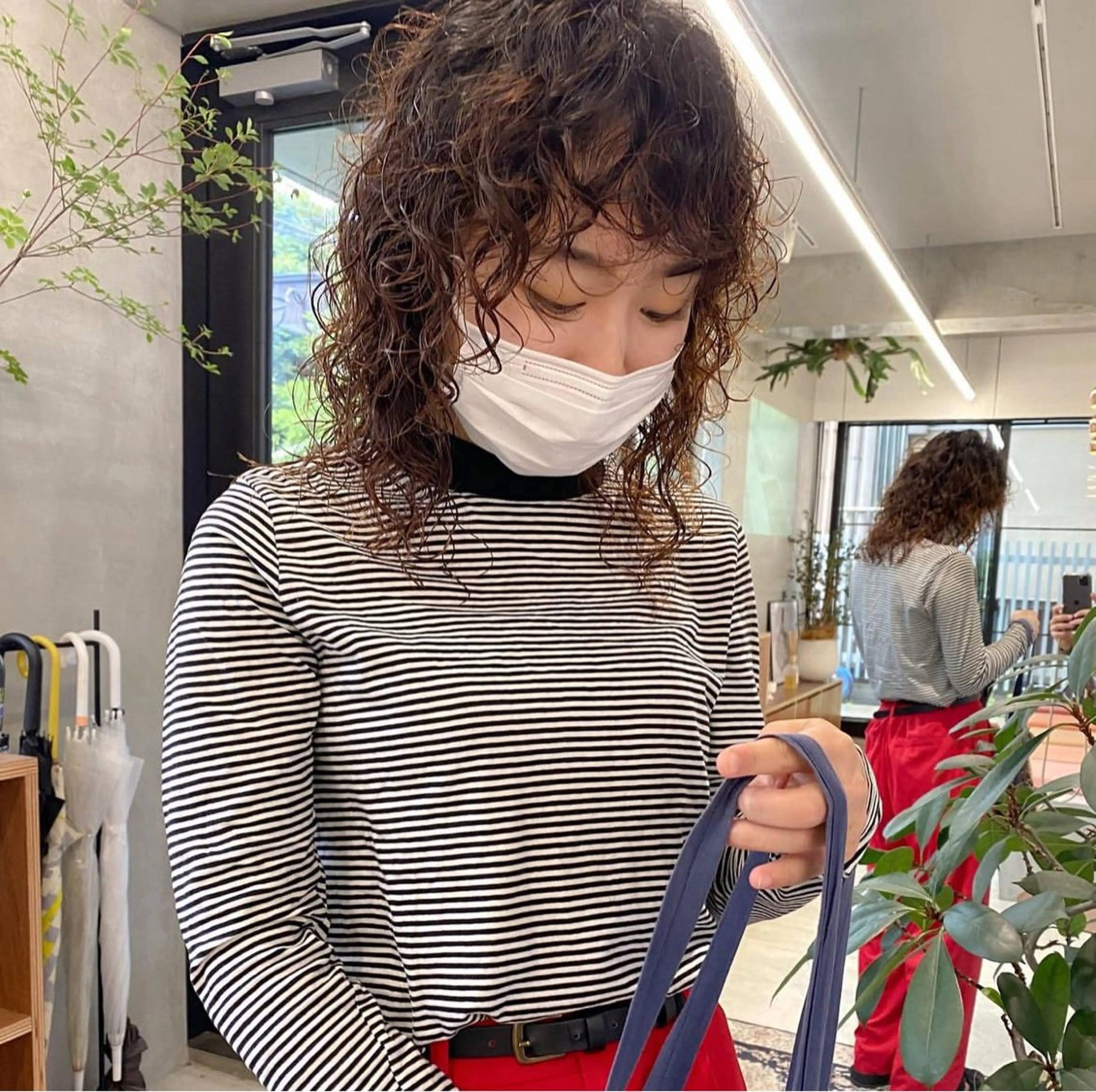 ミディアム パーマ ミディアムパーマ ボブ レイヤーカット ケアブリーチ/ ハイトーン/牧野のヘアスタイル