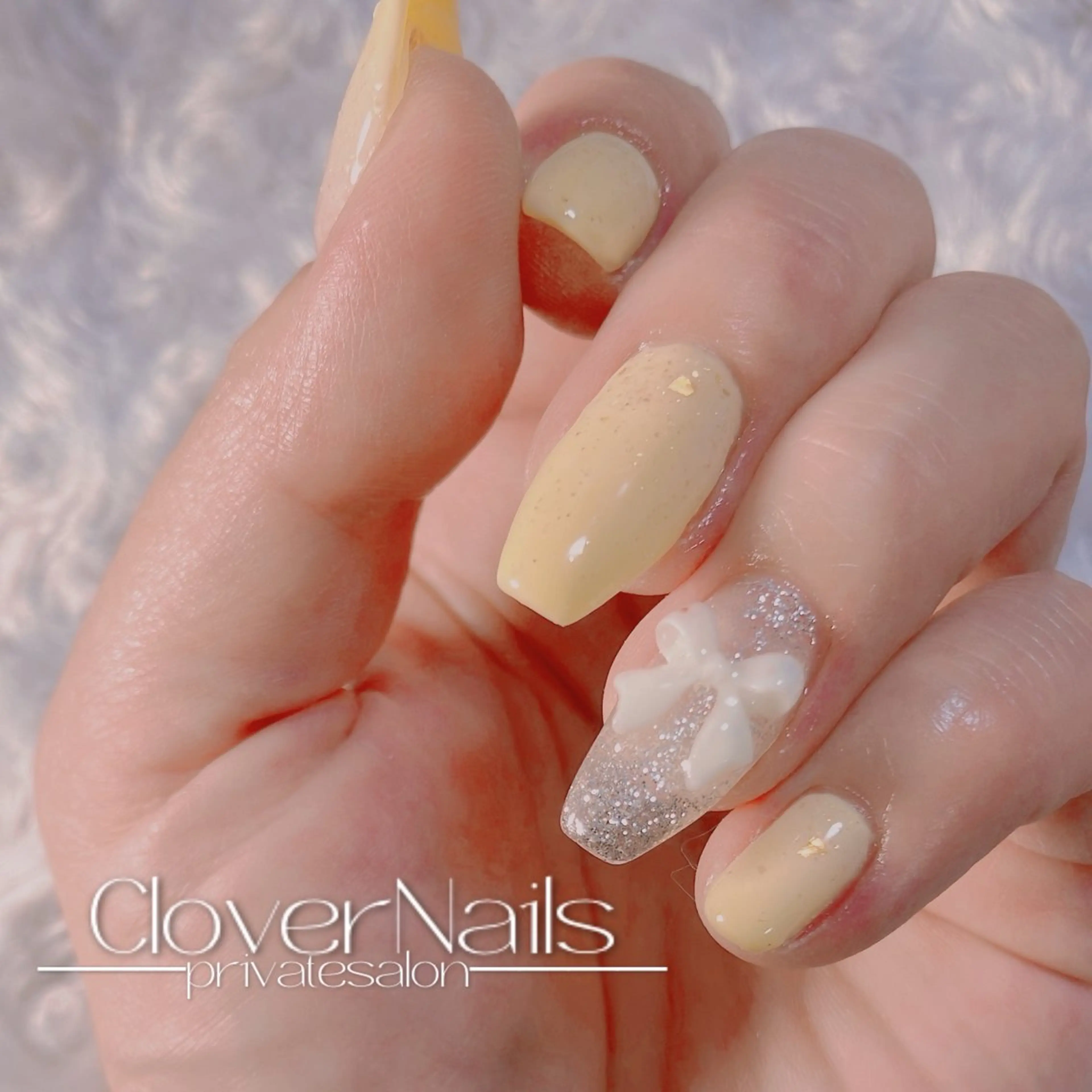 ネイル アートネイル リボン 黄色 自宅ネイルサロン クロバーネイルのネイルデザイン