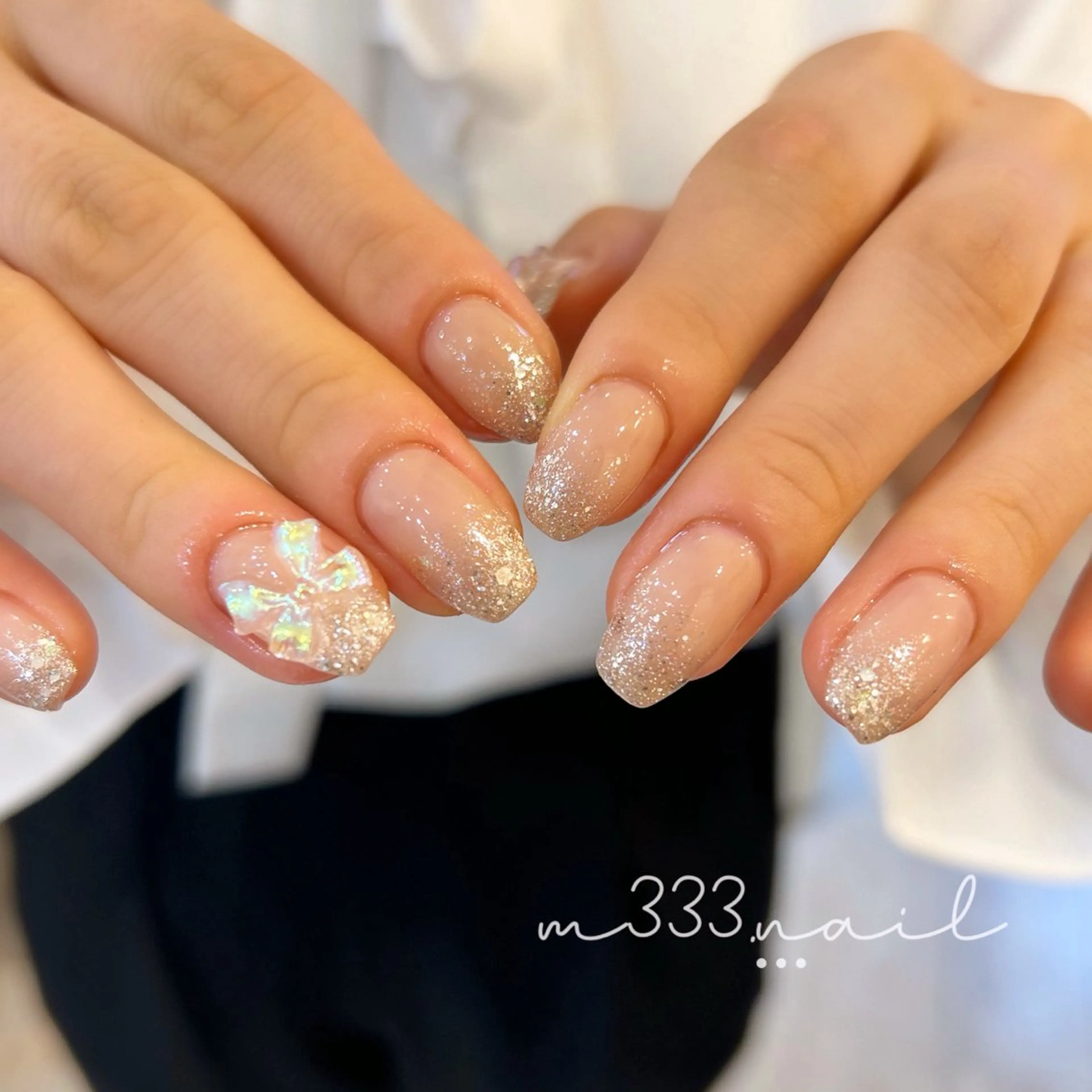 ネイル ガーリー グラデーション キラキラネイル ピンク リボン ハンドネイル hair  MILE.所属・MILE. mukonosouのネイルデザイン