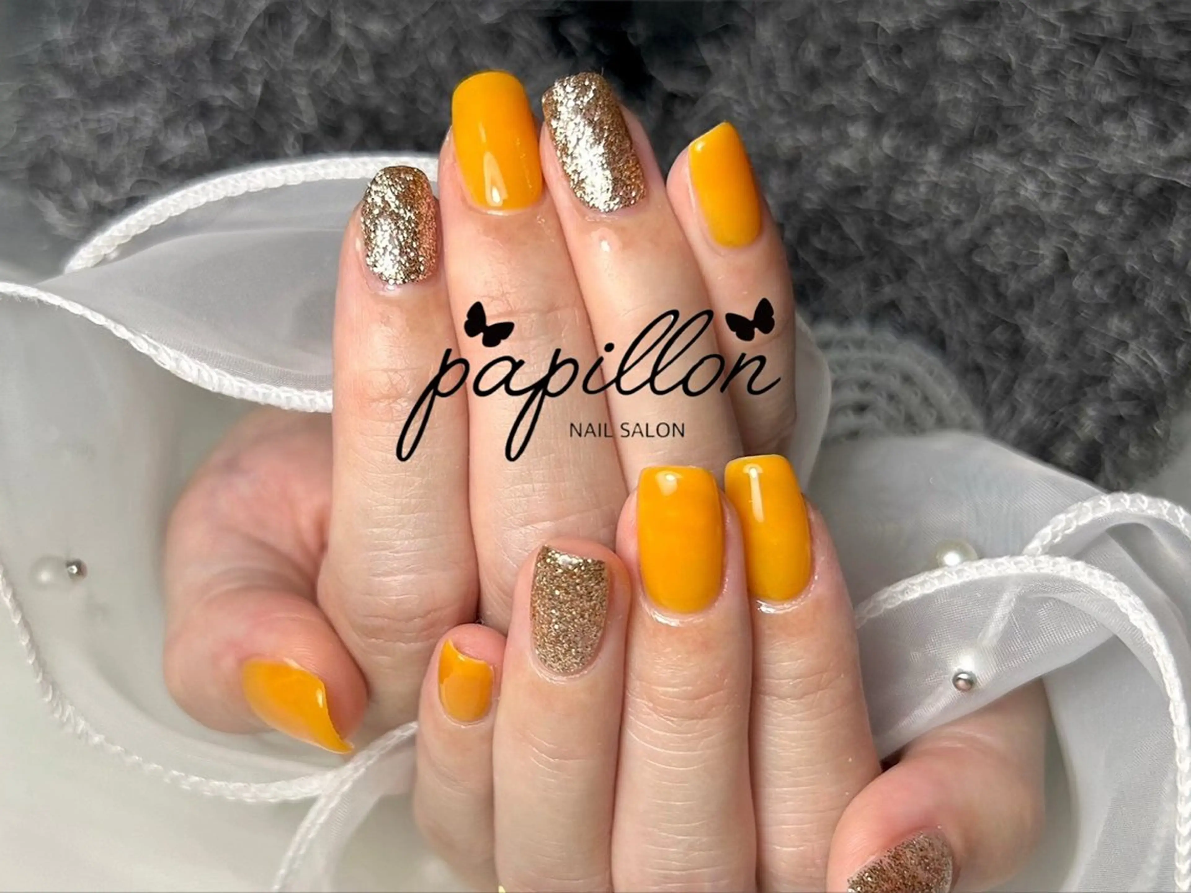 ネイル ラメ(グリッター) オレンジ NAILSALON　papillon所属・NAILSALON papillonのネイルデザイン