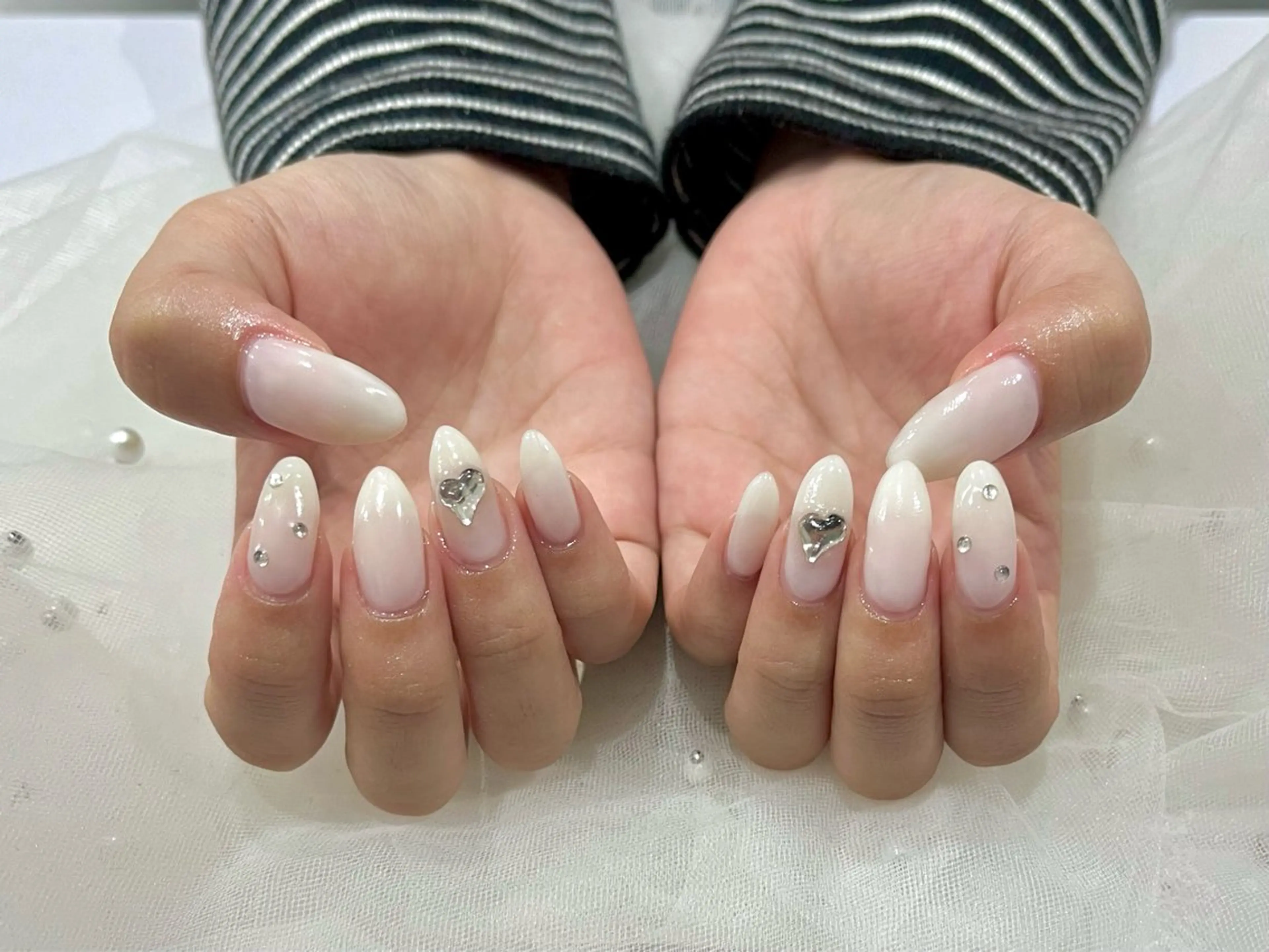 ネイル クリアネイル キラキラネイル ホワイト Nail salon Cielel⟡Ayaのネイルデザイン