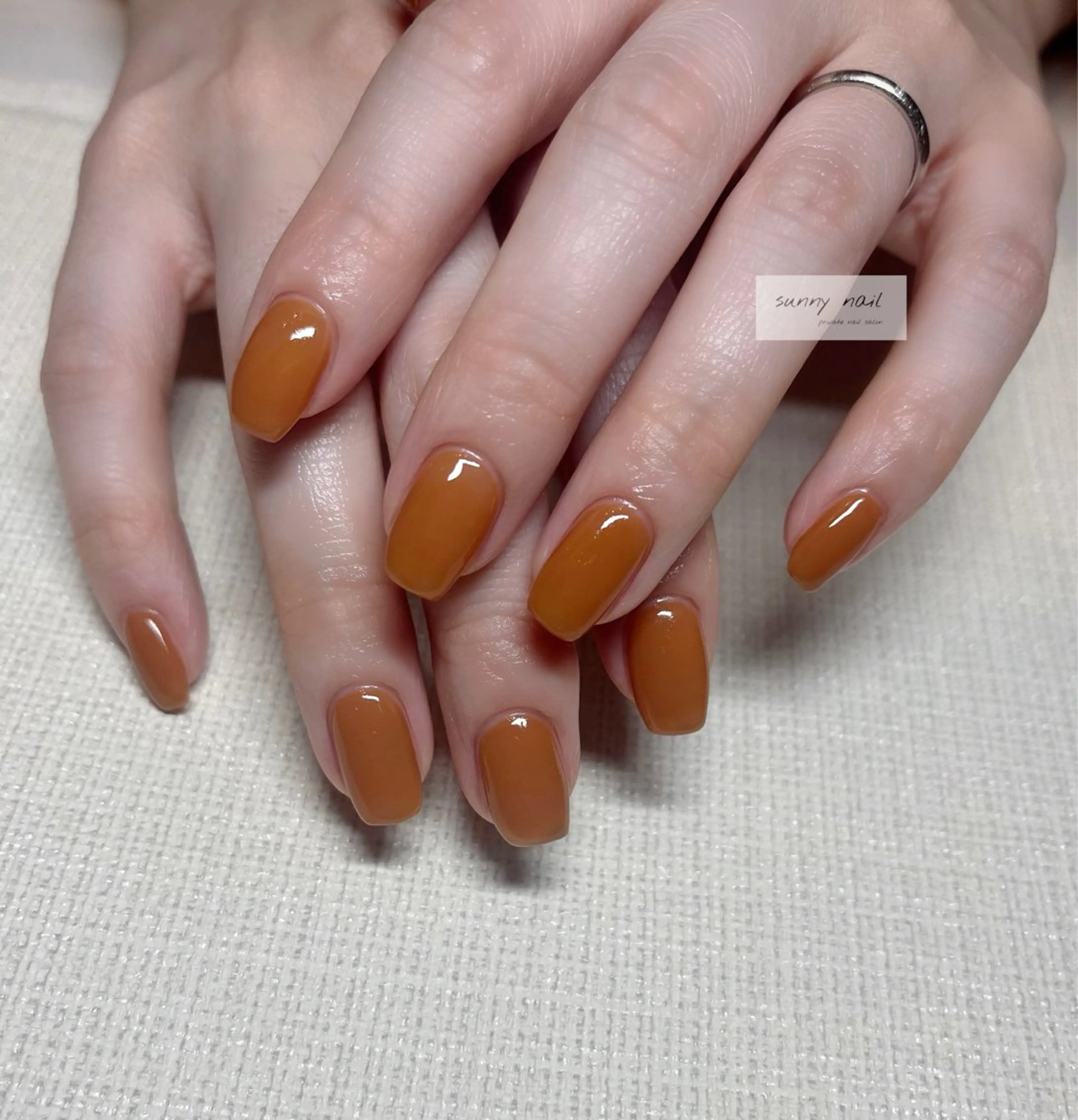 ネイル ブラウン ワンカラーネイル オレンジ sunny nailのネイルデザイン