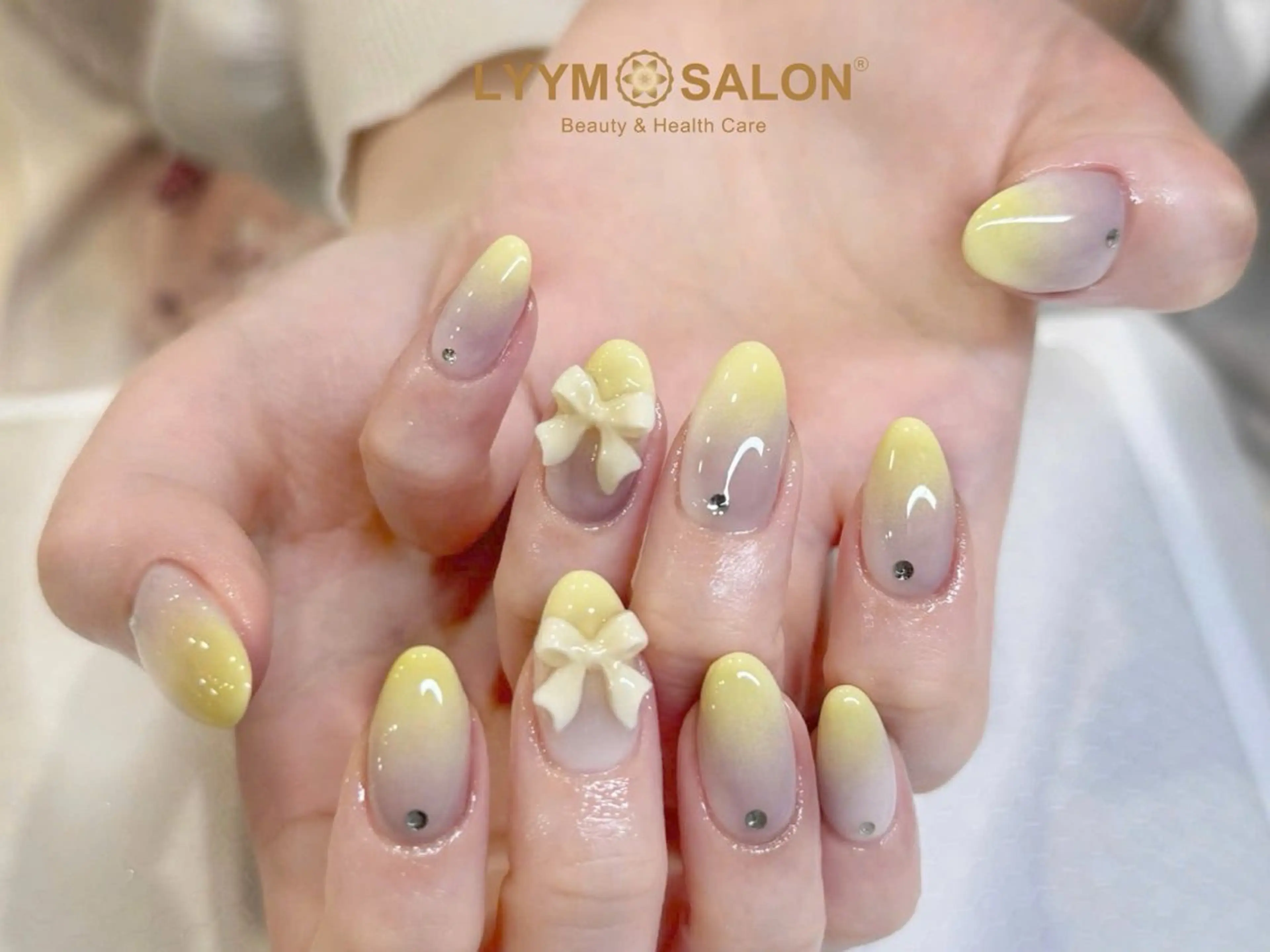 ネイル ガーリー 韓国ネイル パステルネイル リボン シンプルネイル ハンドネイル ハンドケア LYYM Salonのネイルデザイン