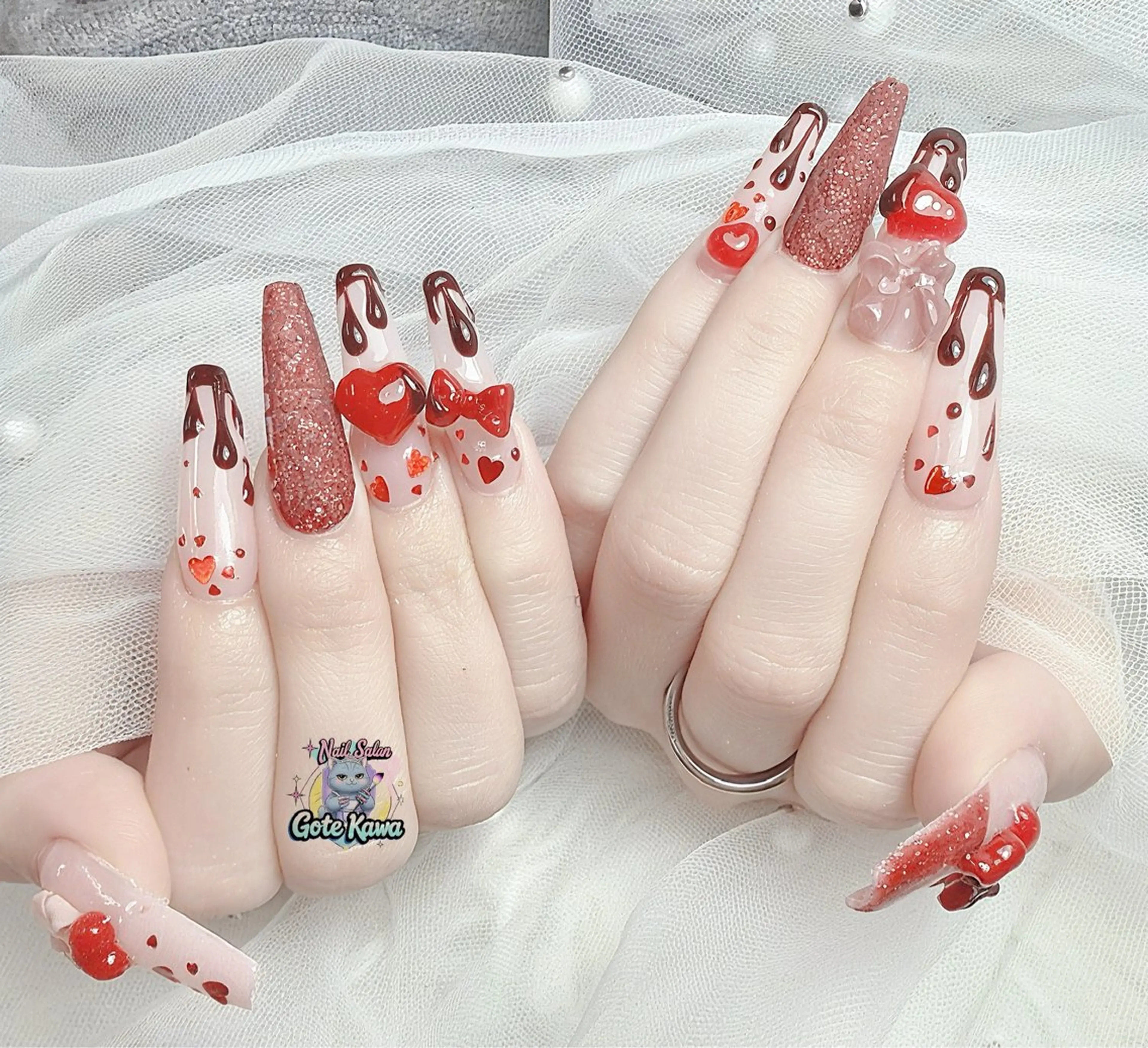 ネイル ハート マットネイル 赤色 リボン バレンタイン ハンドネイル GOTE KAWA Nail Salon(ゴテかわ)所属・Gote Kawa nail salonのネイルデザイン