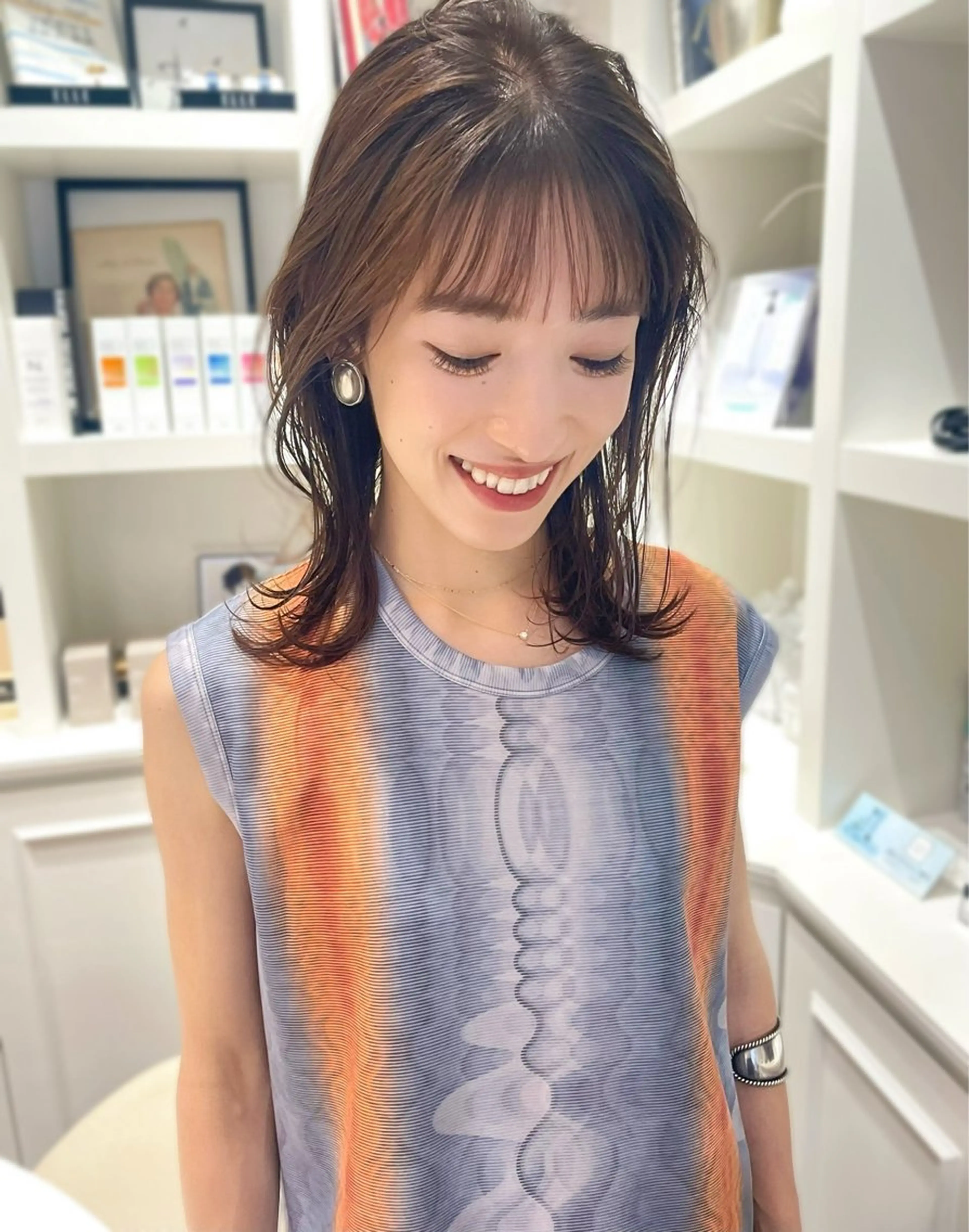 ミディアム ELLE salon 西梅田 小顔カットのヘアスタイル