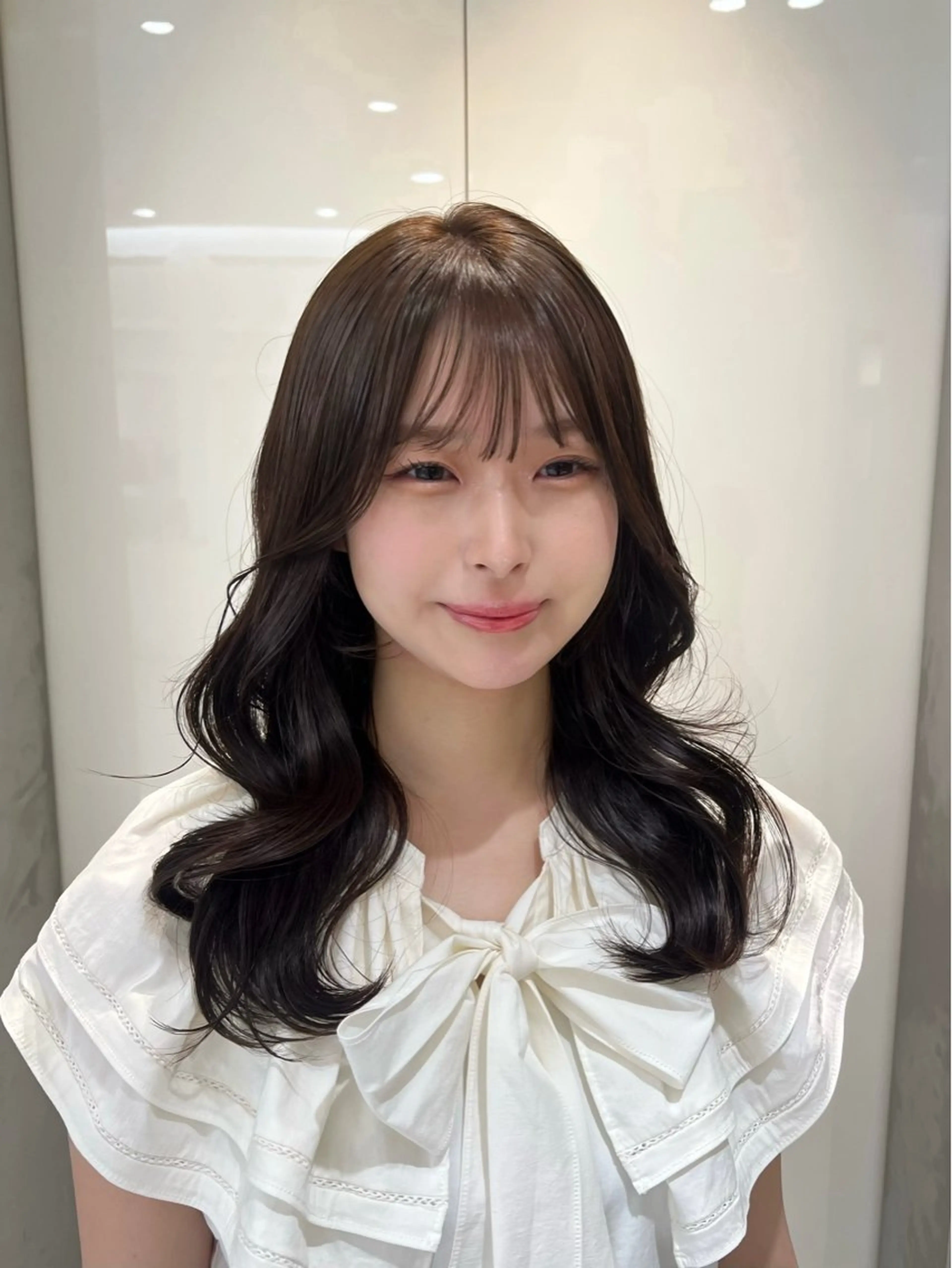 セミロング コテ巻き風パーマ 銀座RINOSEのヘアスタイル