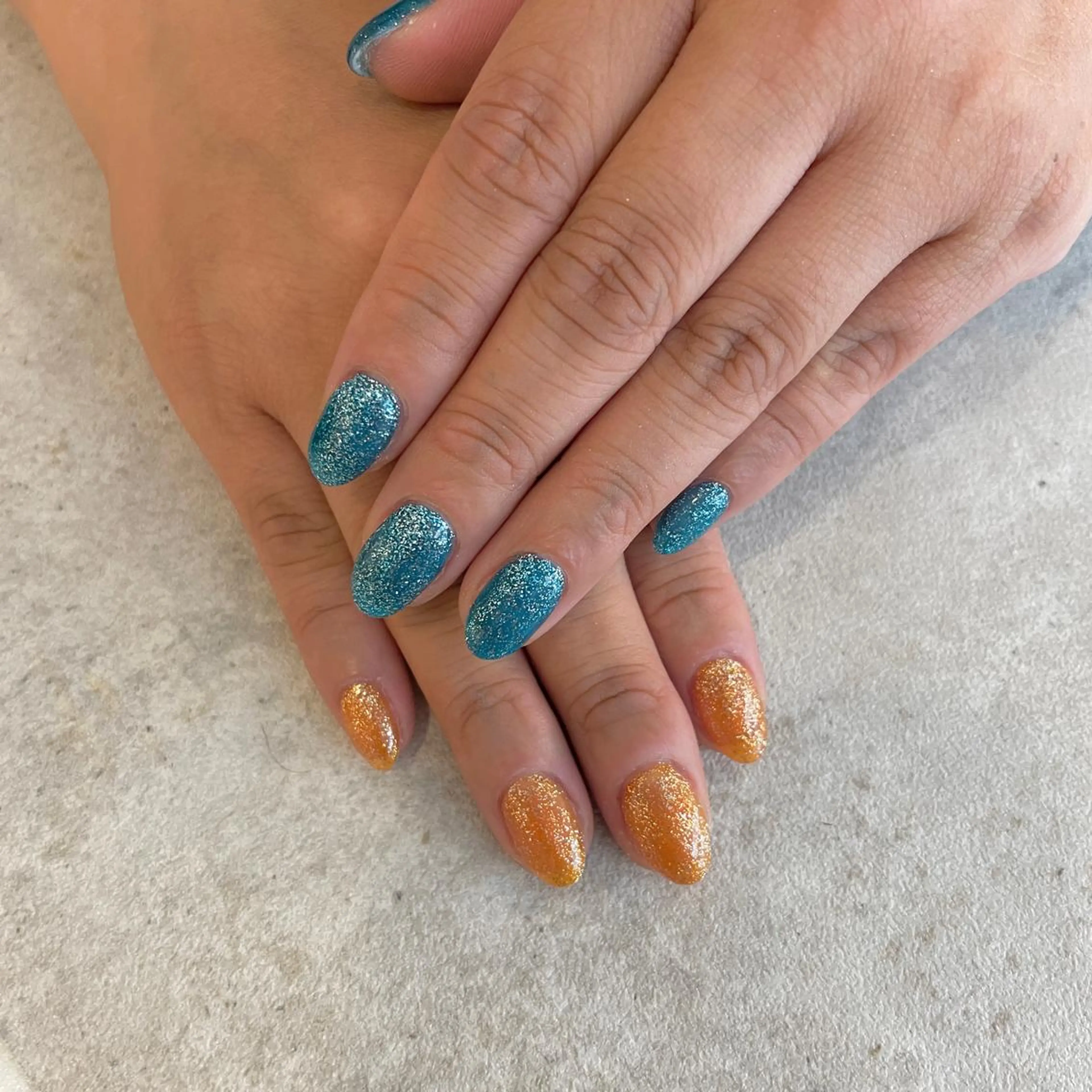 ネイル ブルー オレンジ mignon by CHERIM A.tのマツエク・マツパデザイン