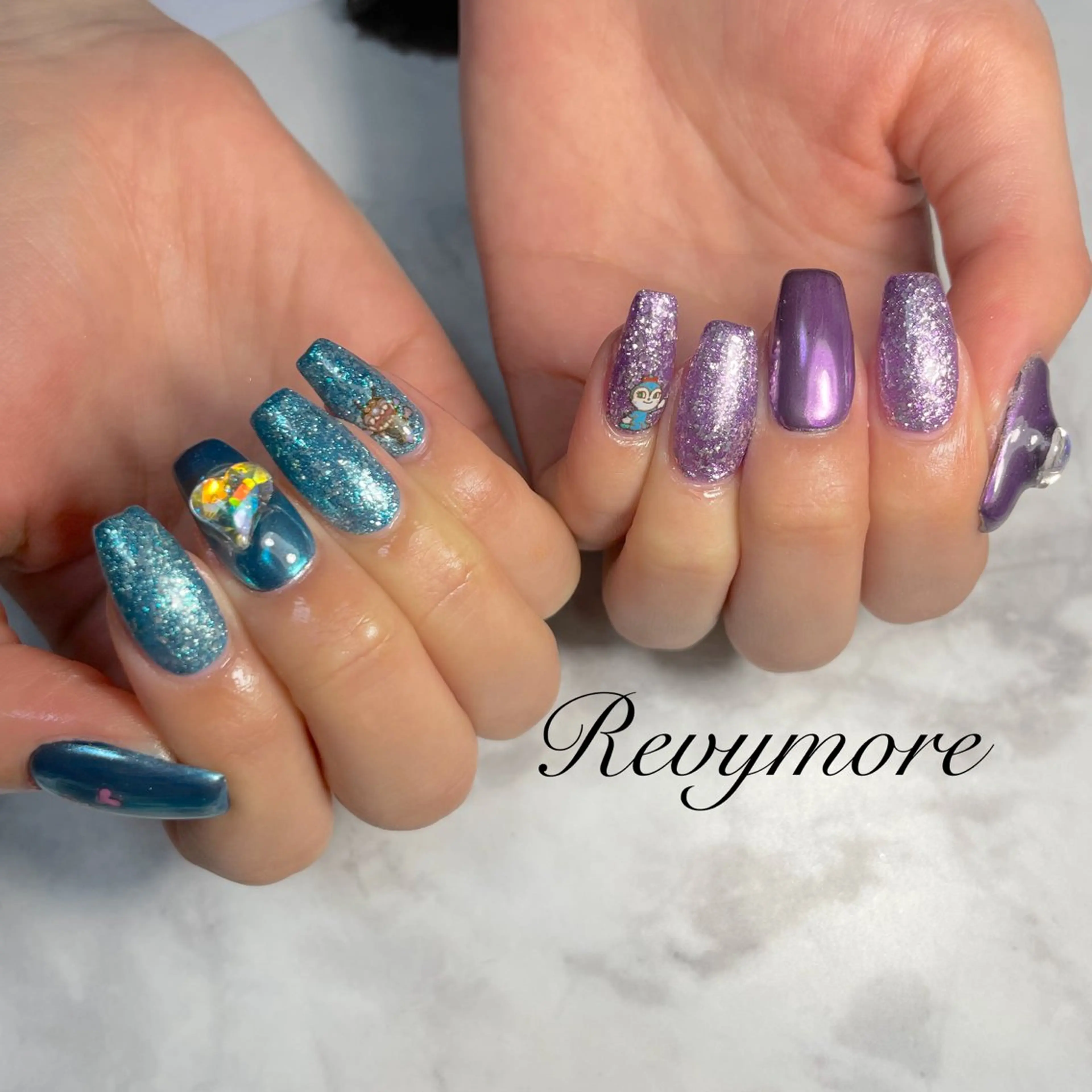 ネイル ブルー ジェルネイル キラキラネイル 韓国ネイル ミラーネイル nail salon Revymore所属・nail salon Revymoreのネイルデザイン