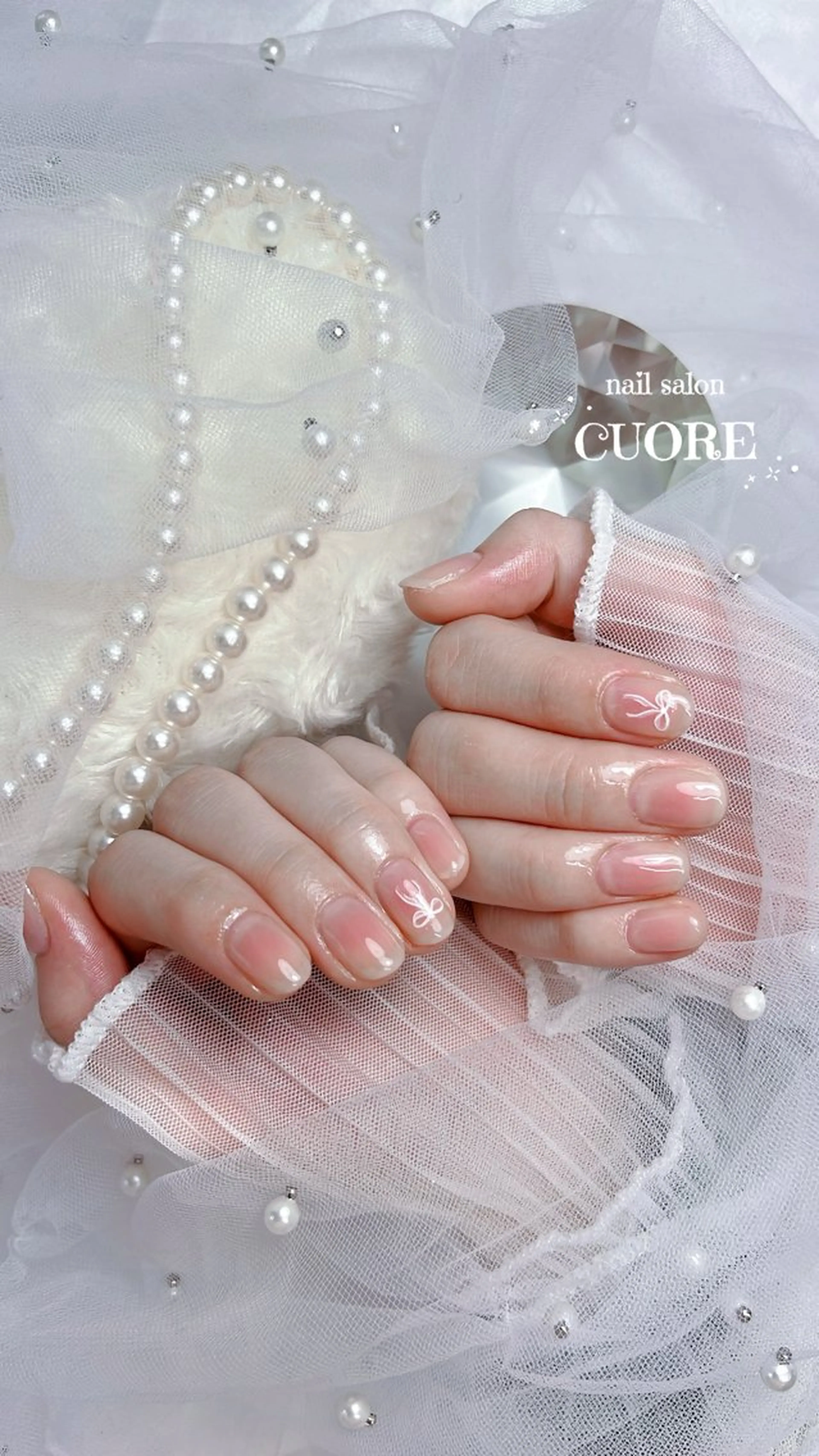 ネイル チークネイル 成人式 オフィスネイル リボン シンプルネイル ハンドネイル CUORE____nail所属・nail salon CUOREのネイルデザイン