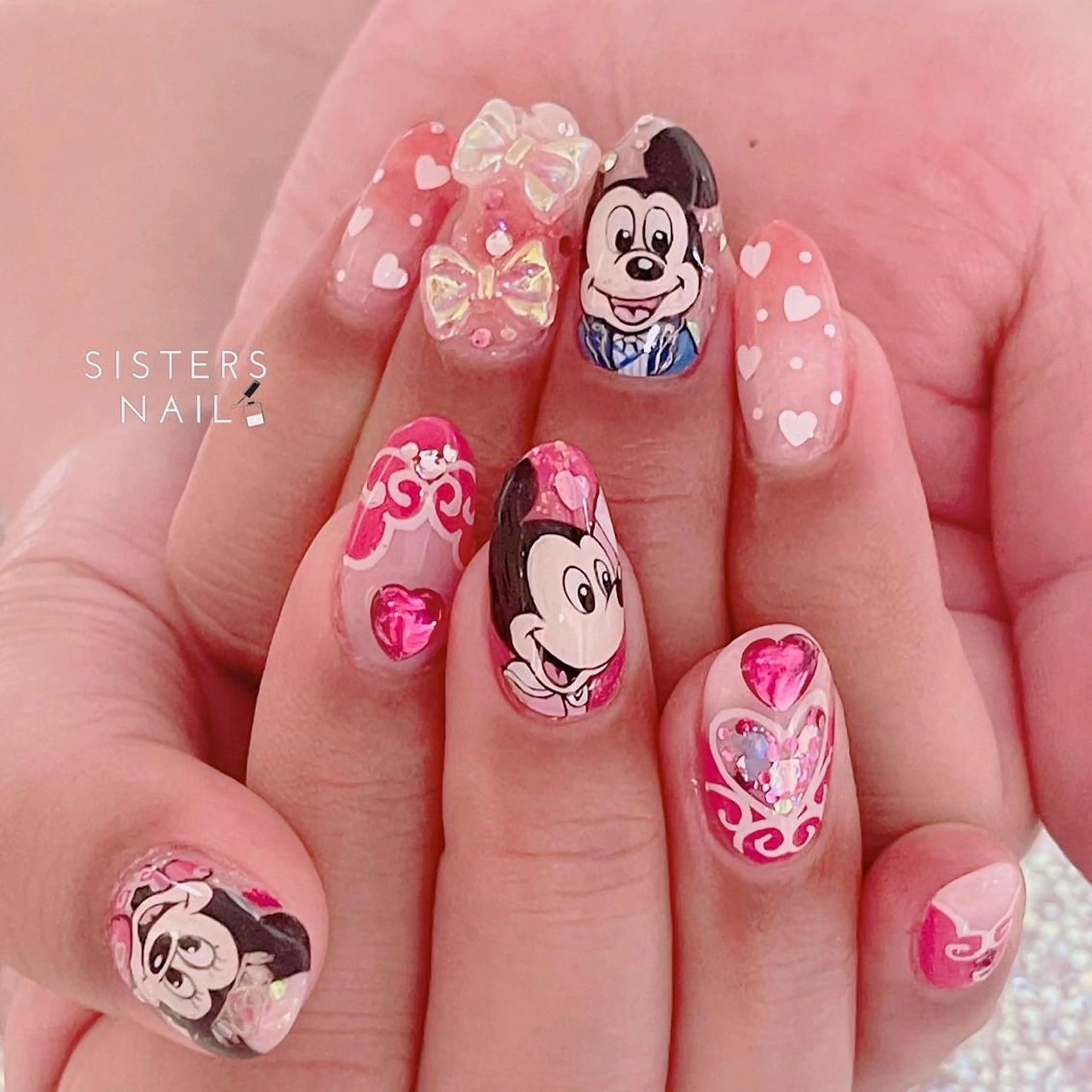 ネイル アートネイル ハート キラキラネイル リボン sisters nail.fのネイルデザイン