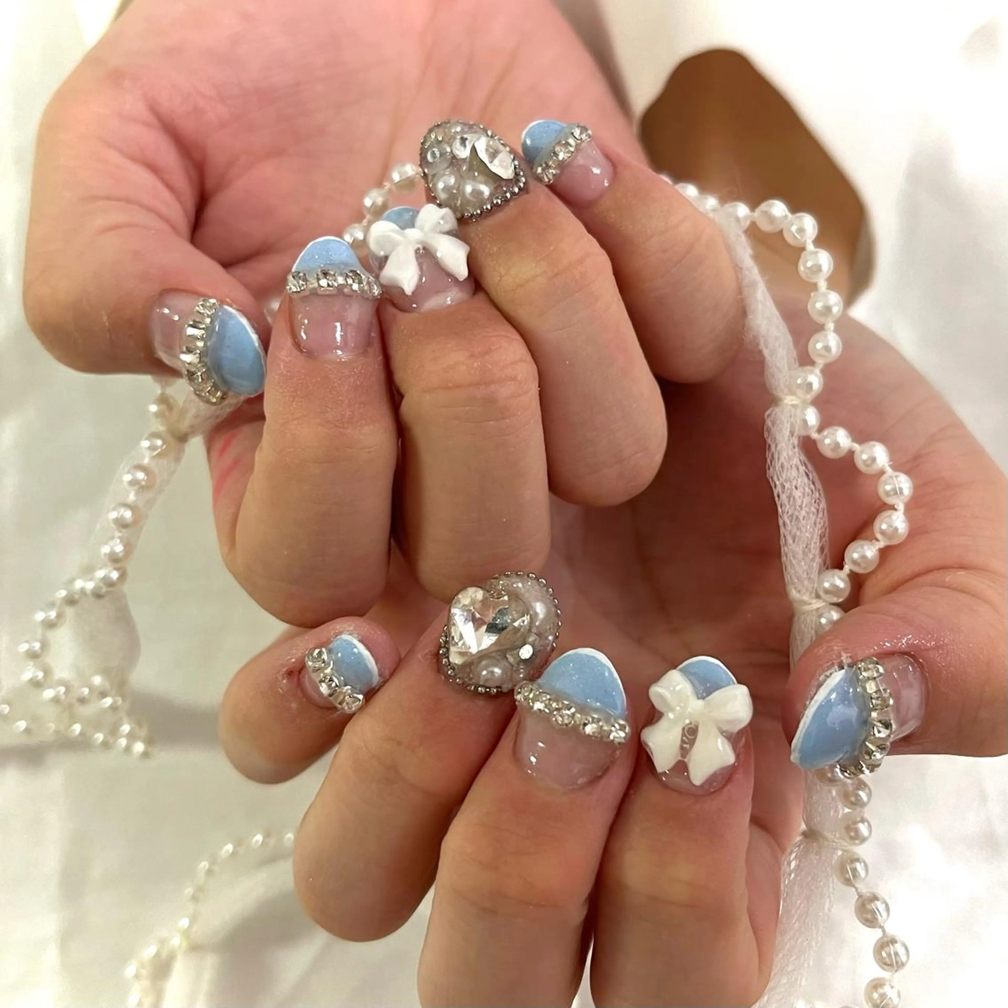 ネイル 韓国ネイル 水色 リボン 韓国ネイル💠 Tomoのネイルデザイン