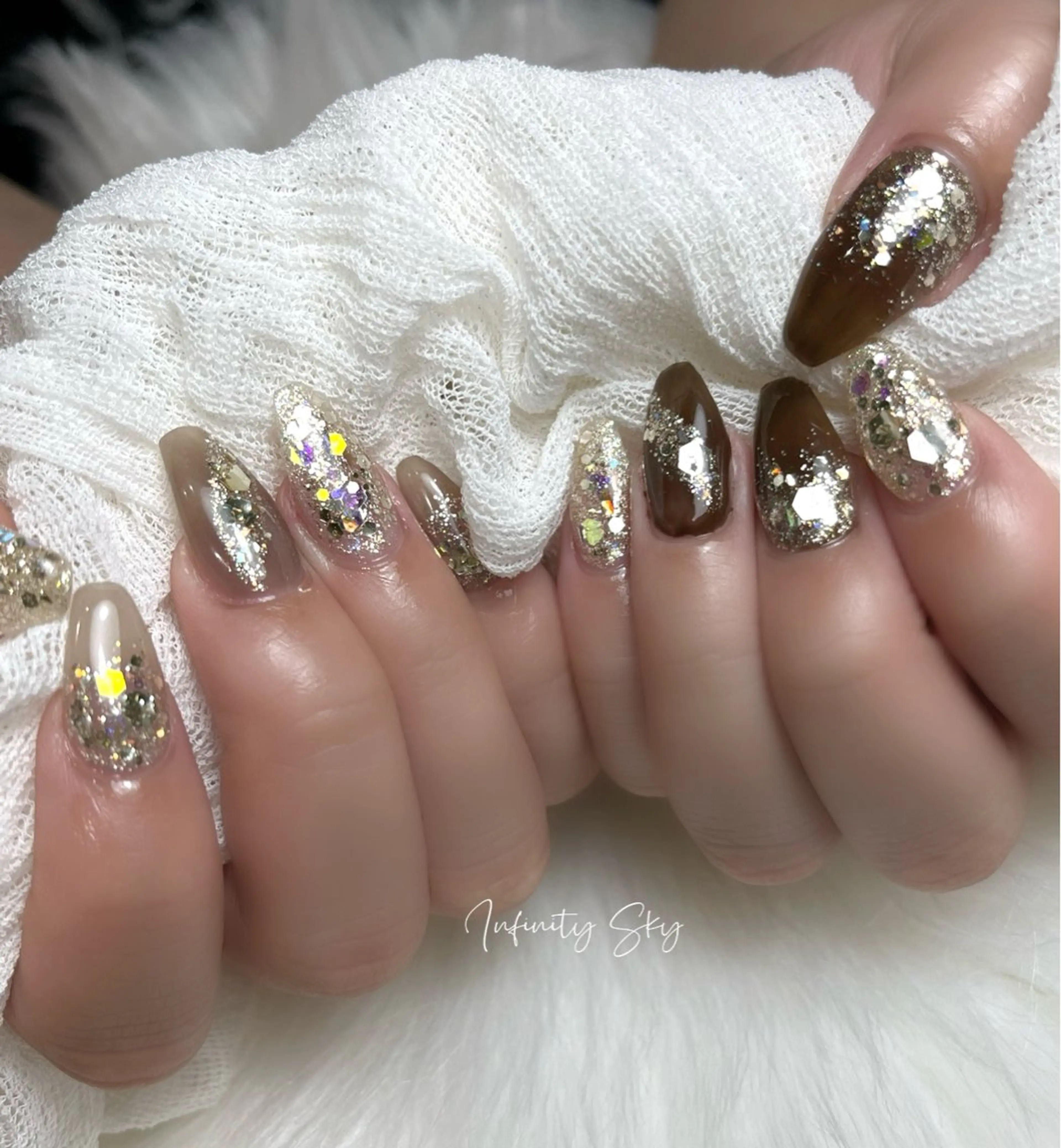 ネイル ブラウン ロングネイル infinity skyのネイルデザイン