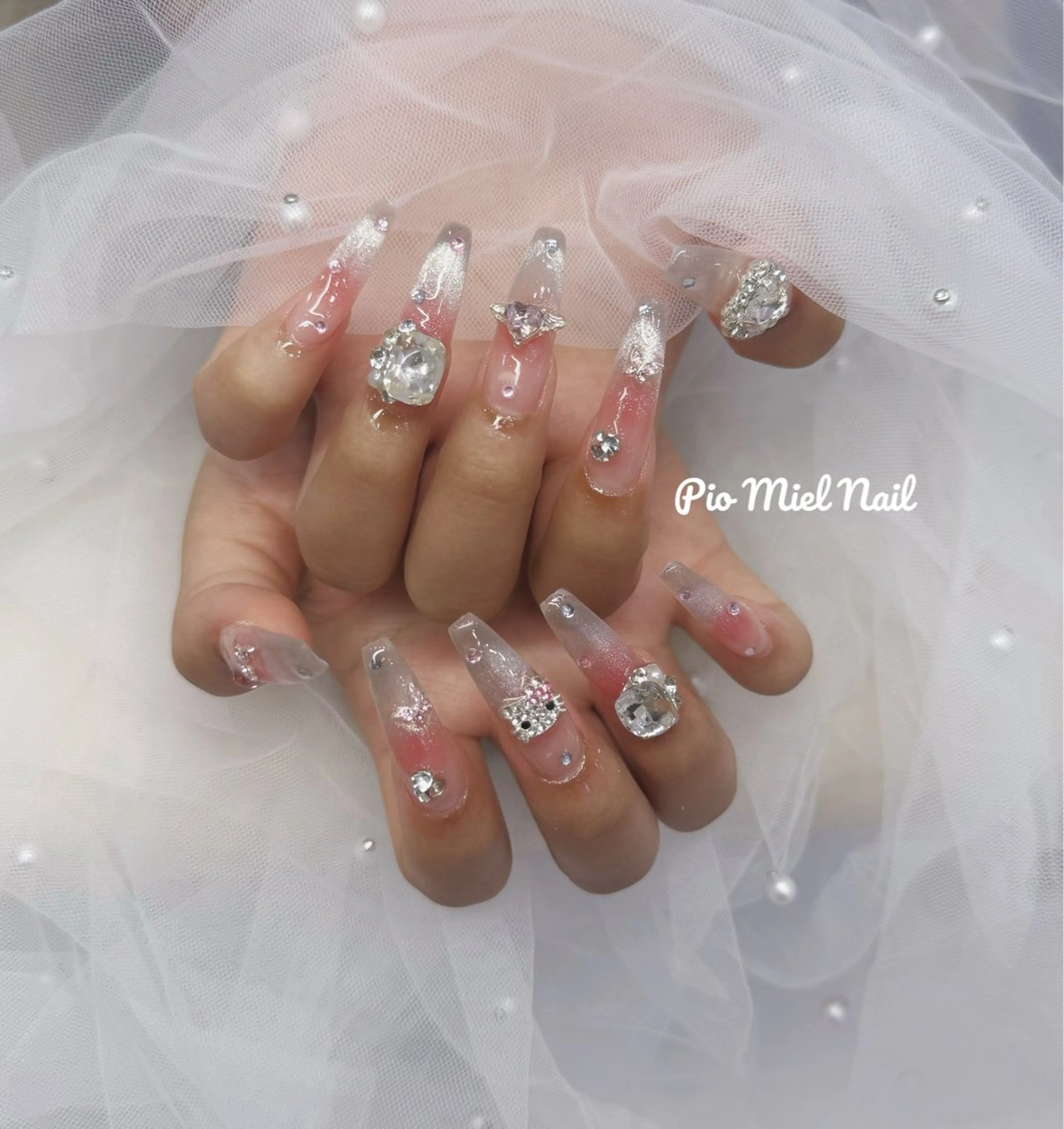 セミロング ハンドネイル Pio Mielのネイルデザイン
