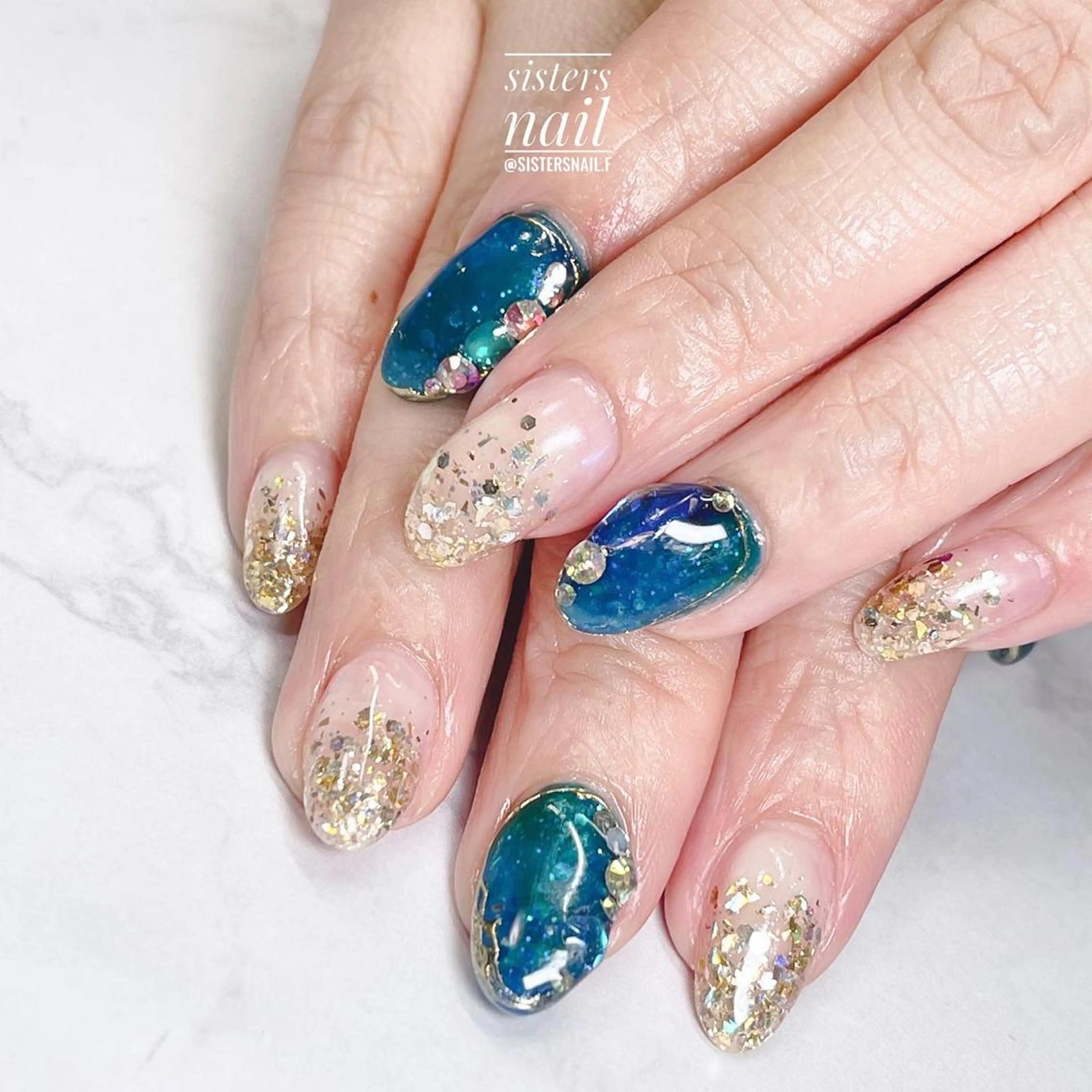 ネイル アートネイル ブルー グラデーション キラキラネイル ラメ(グリッター) sisters nail.fのネイルデザイン