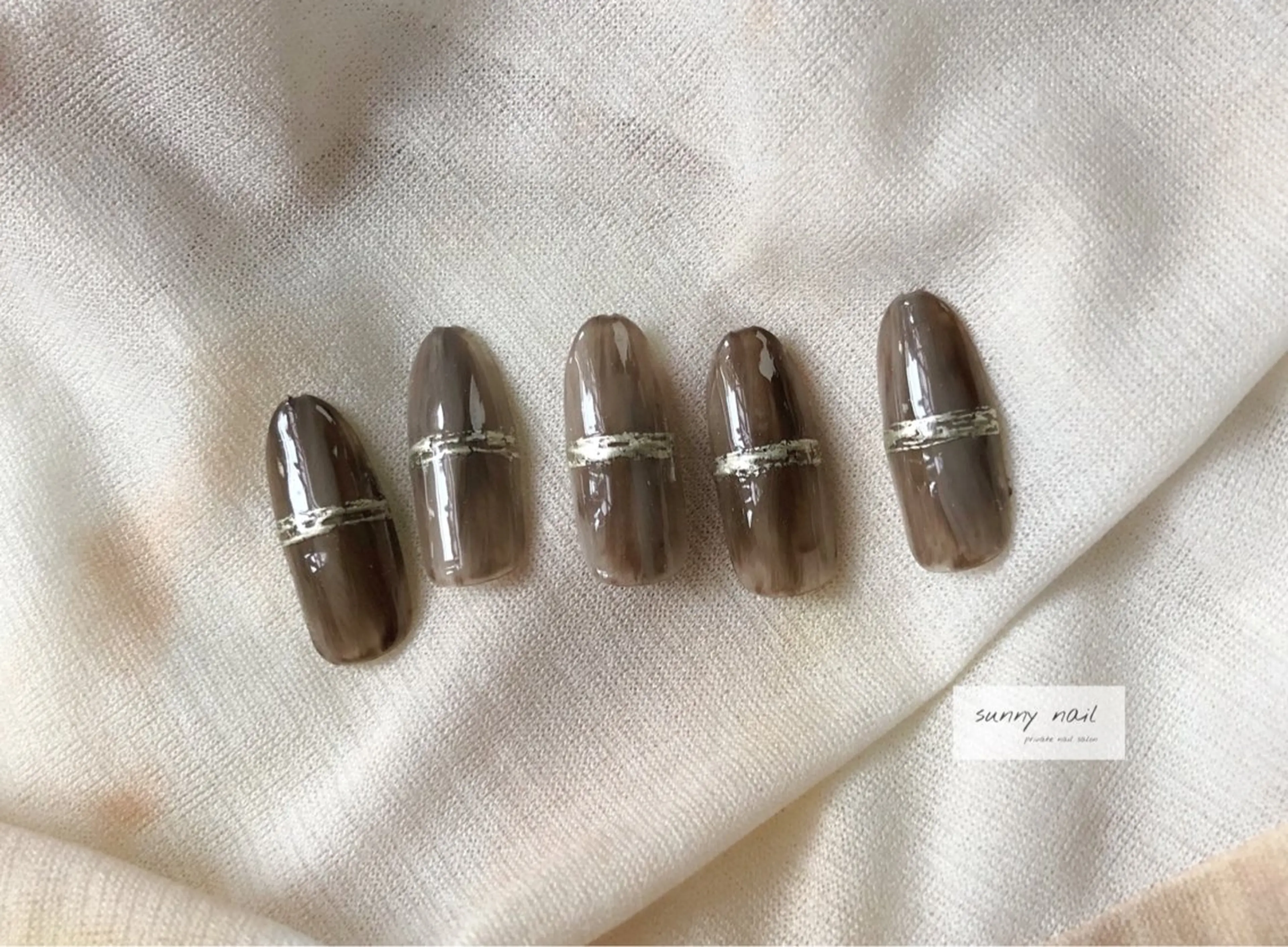 ネイル アートネイル ブラウン カジュアル ニュアンスネイル シンプルネイル sunny nailのネイルデザイン