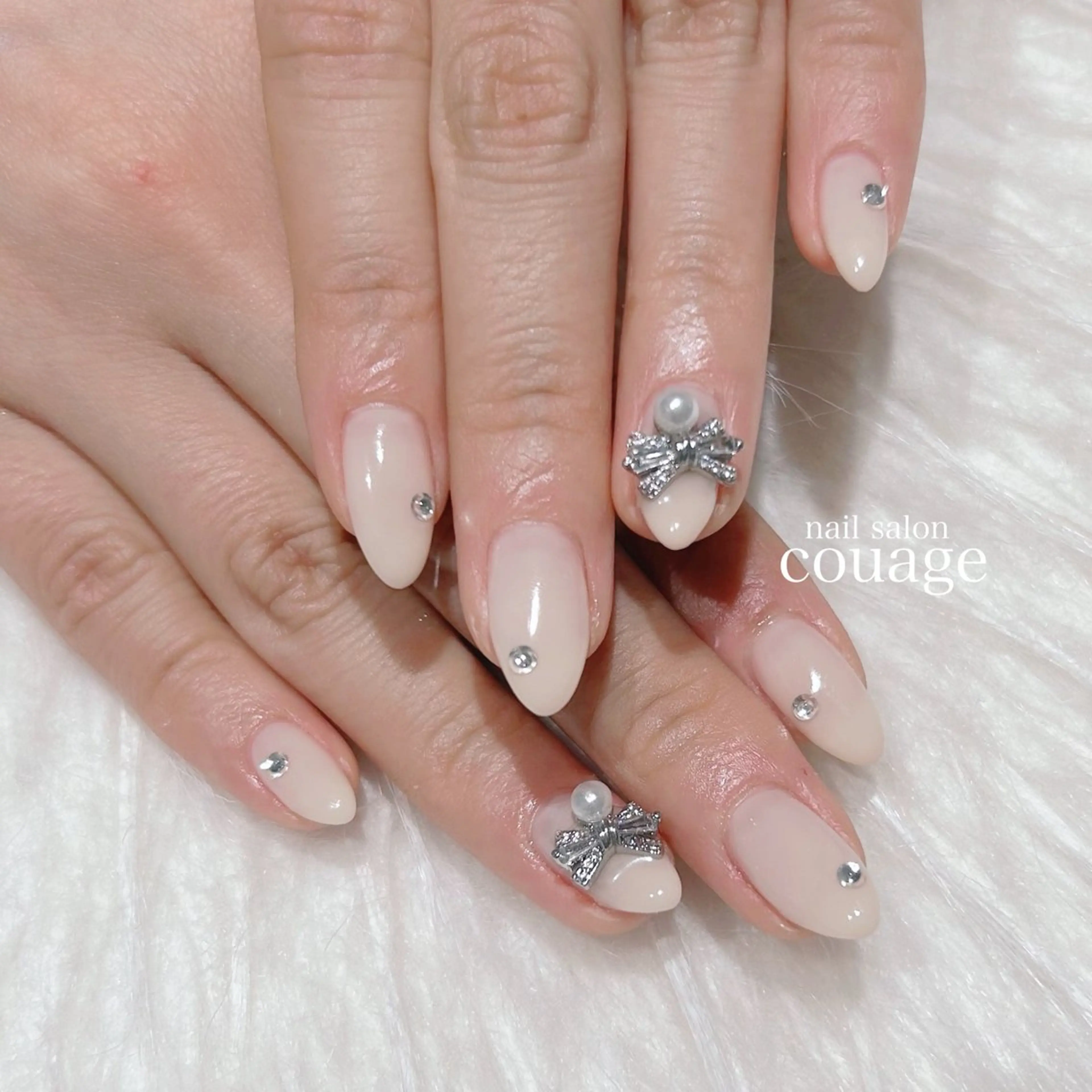 ネイル キラキラネイル リボン ハンドネイル ネイルサロンcourage所属・ネイルサロン courageのネイルデザイン