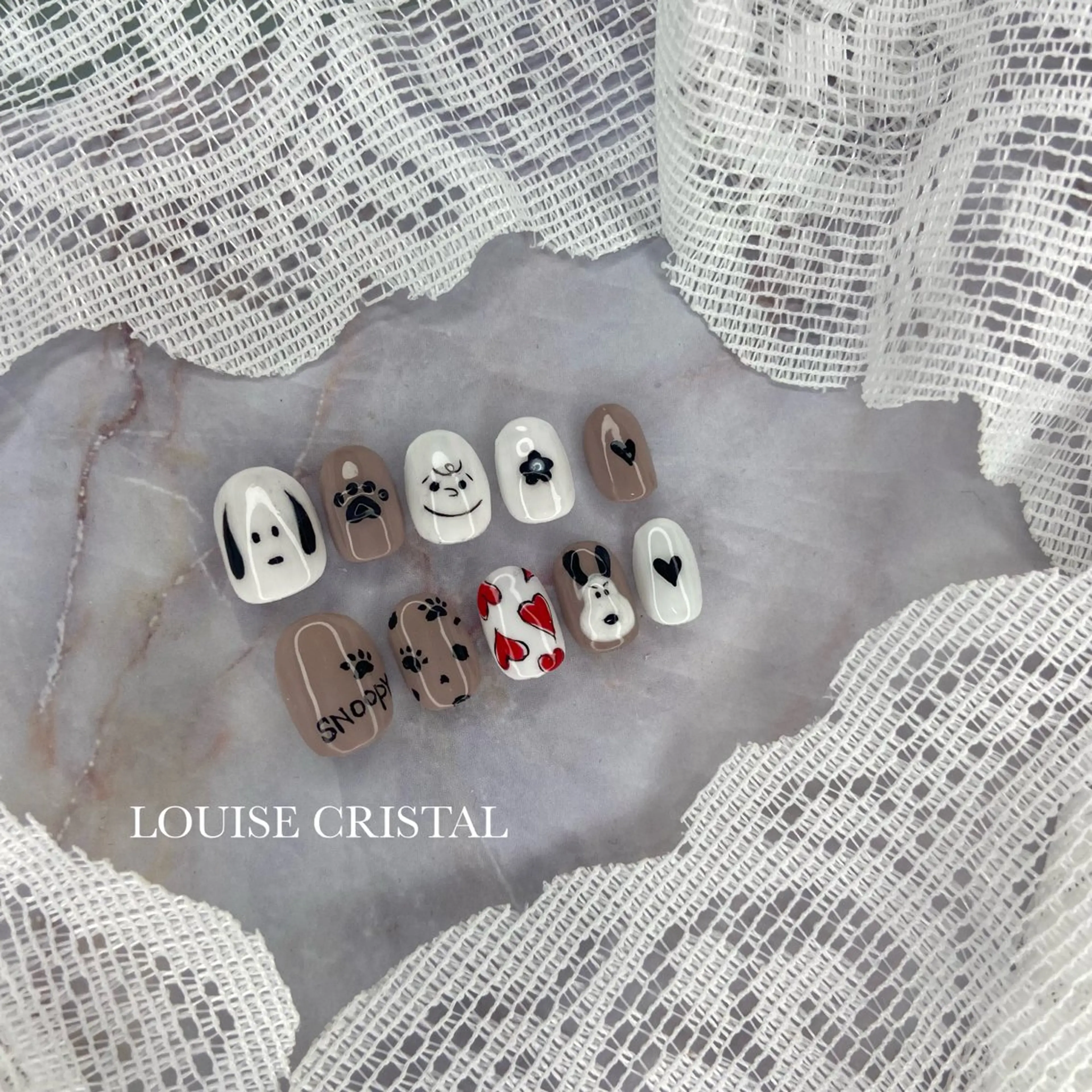 ネイル ハンドネイル LOUISE CRYSTALのネイルデザイン