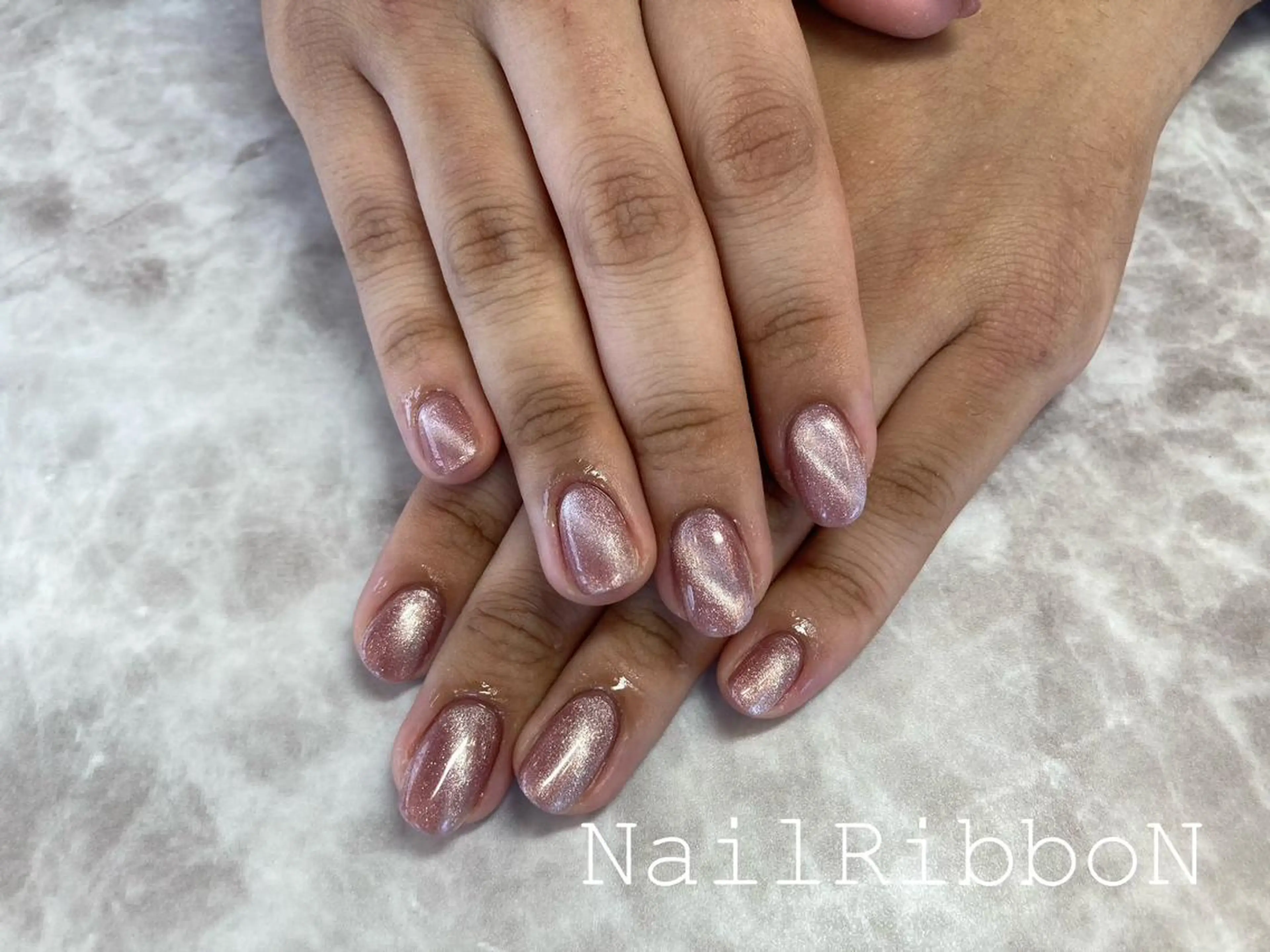 ネイル ネイルリボン 受付スタッフのネイルデザイン