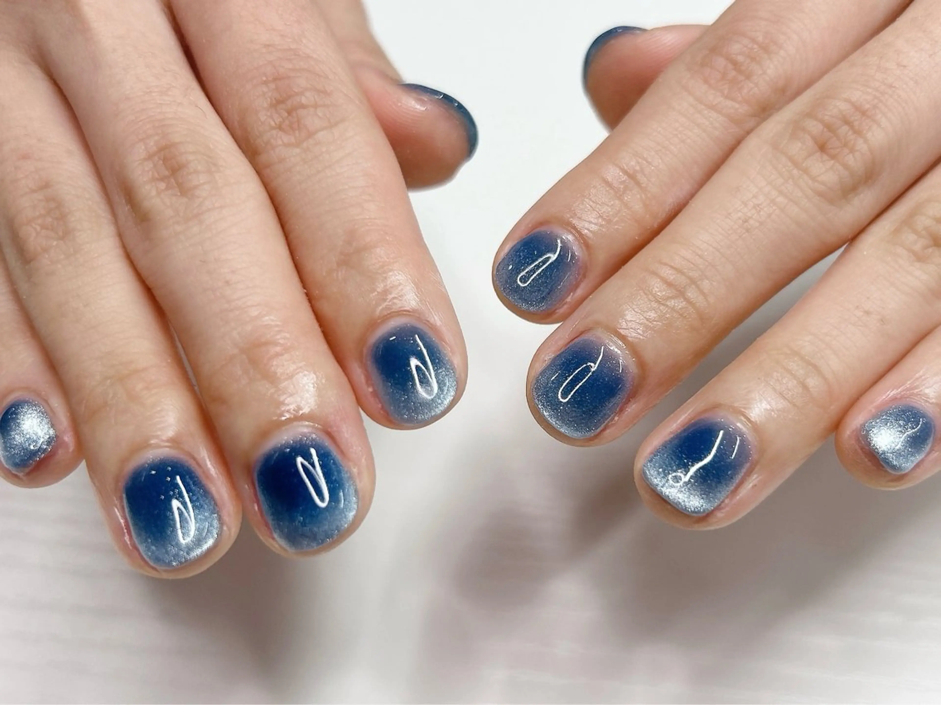 ネイル ブルー 桜ネイル グラデーション キラキラネイル マグネットネイル ハンドネイル Forca total studio所属・Forca Airaのネイルデザイン