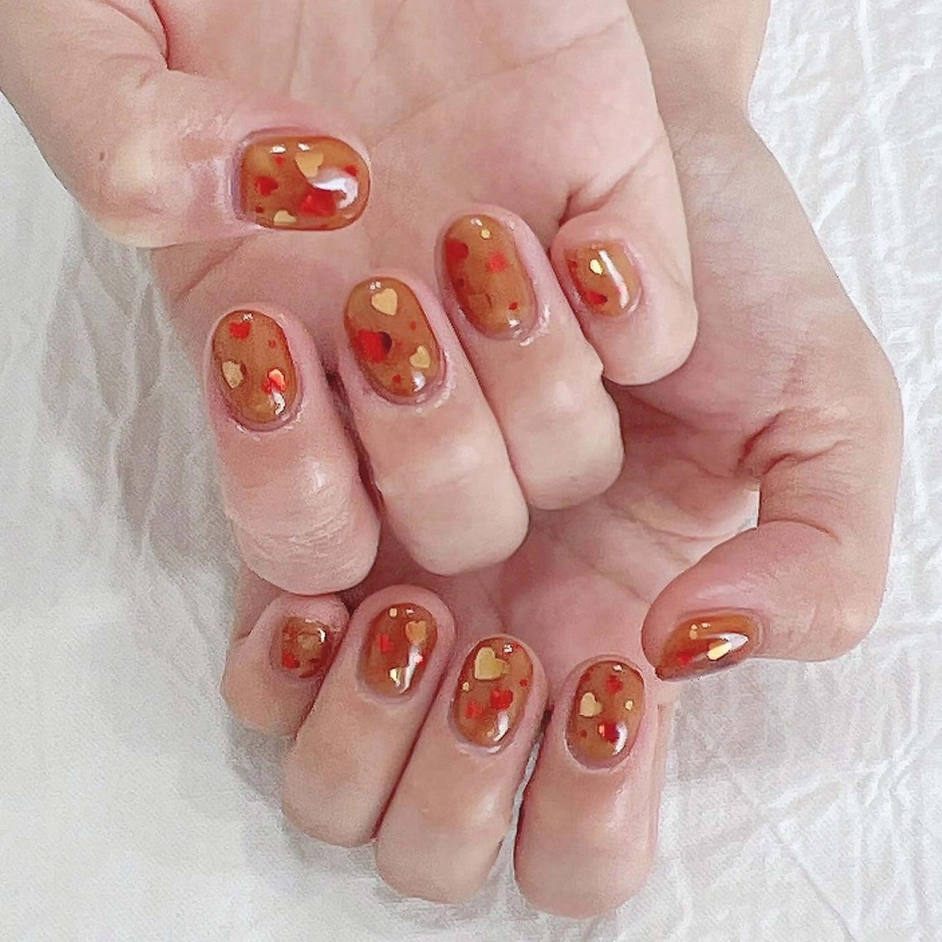 ネイル ブラウン ハート オレンジ 赤色 ハンドネイル peaberry nailのネイルデザイン