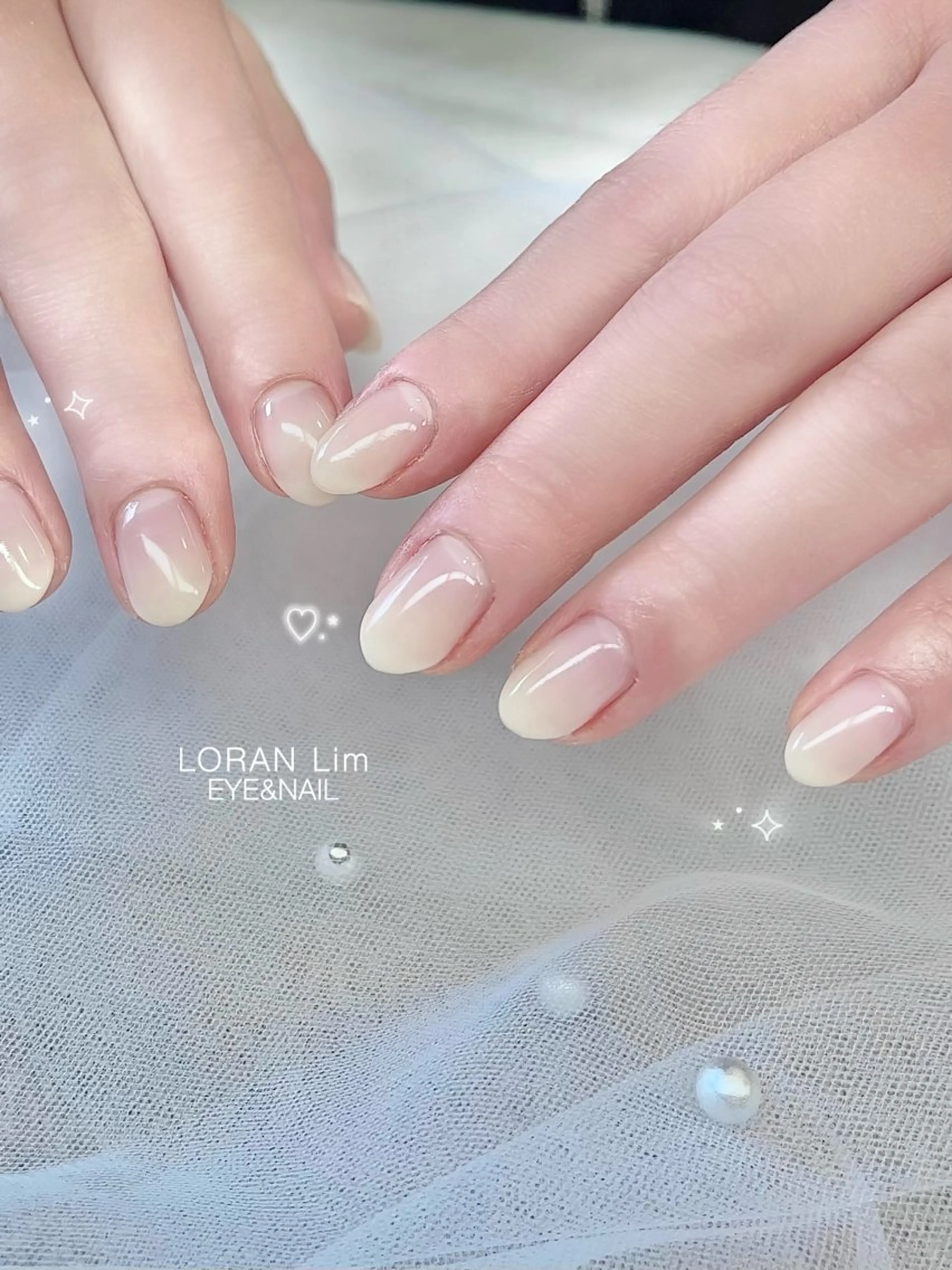 ネイル グラデーション ホワイト LORAN  Lim EYE&NAIL【ローランリム】所属・LORAN Lim 紫月のネイルデザイン