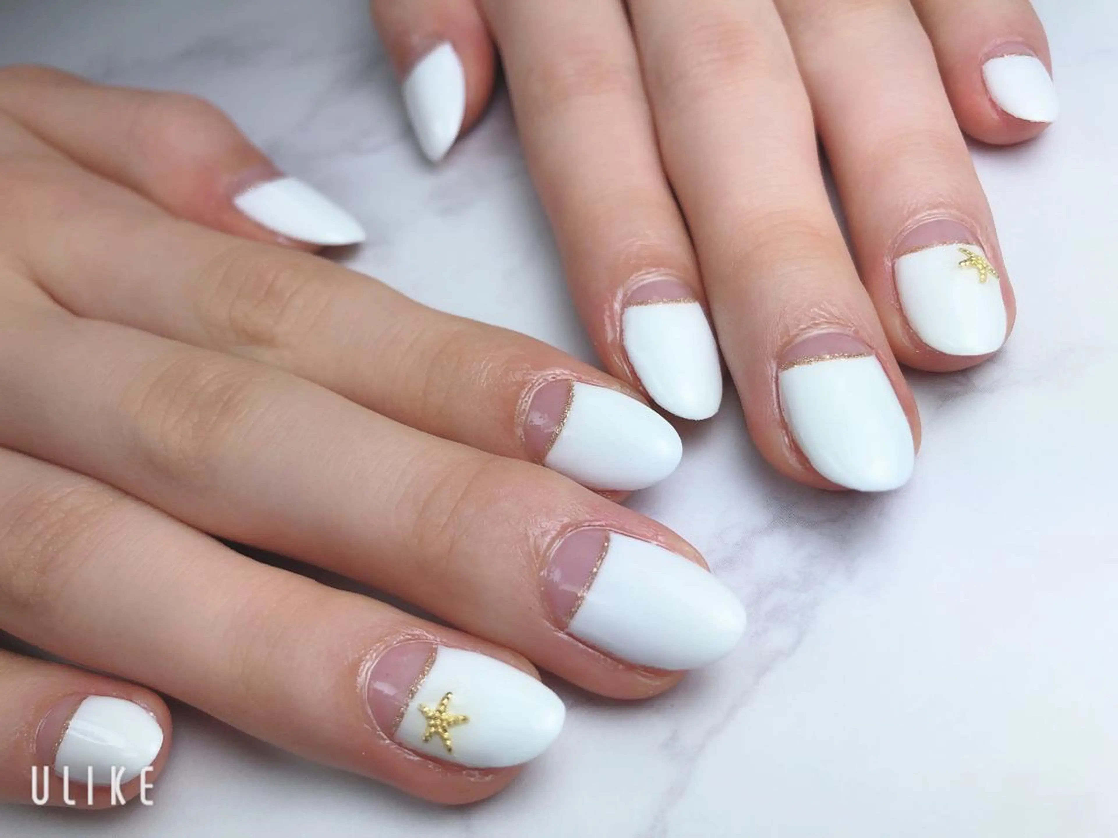 ネイル フレンチネイル ゴールド 逆フレンチ ホワイト Nailsalon Luanaのネイルデザイン