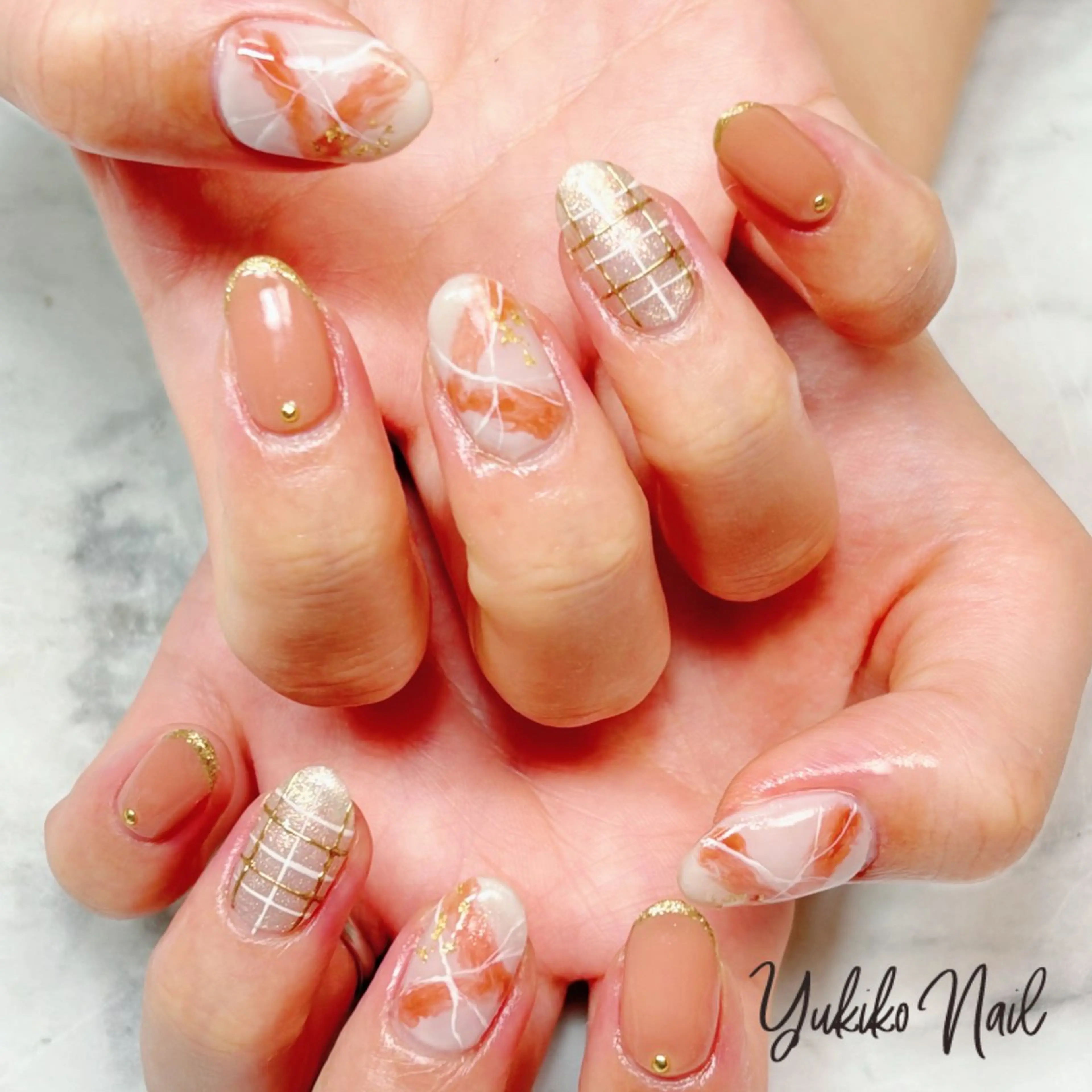 ネイル 大理石ネイル(マーブル) オレンジ ハンドネイル ユキコ ネイルのネイルデザイン