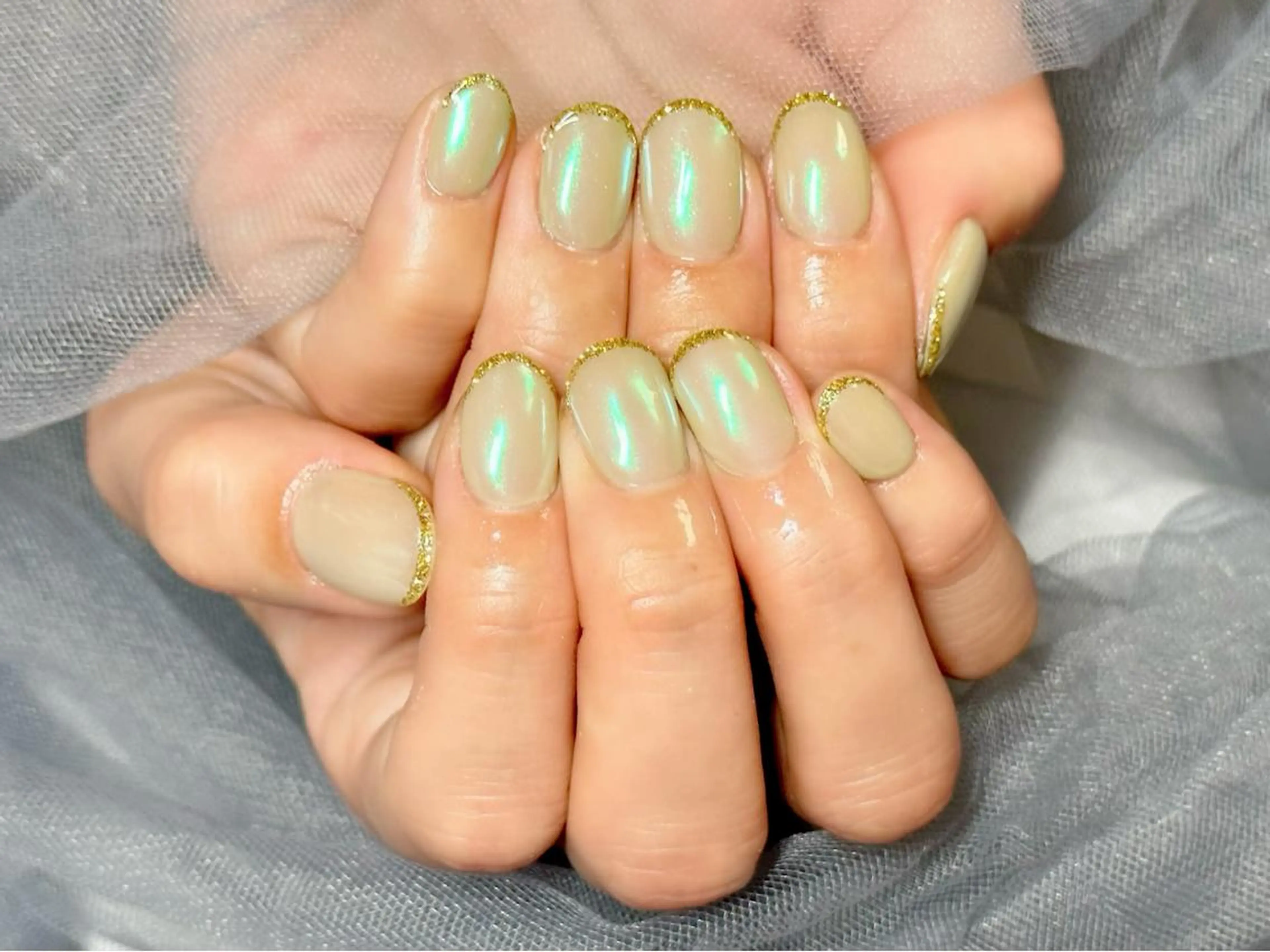 ネイル オーロラネイル フレンチネイル ゴールド グリーン ラメ(グリッター) ハンドネイル KURELLY所属・Nail Salon KURELLYのネイルデザイン