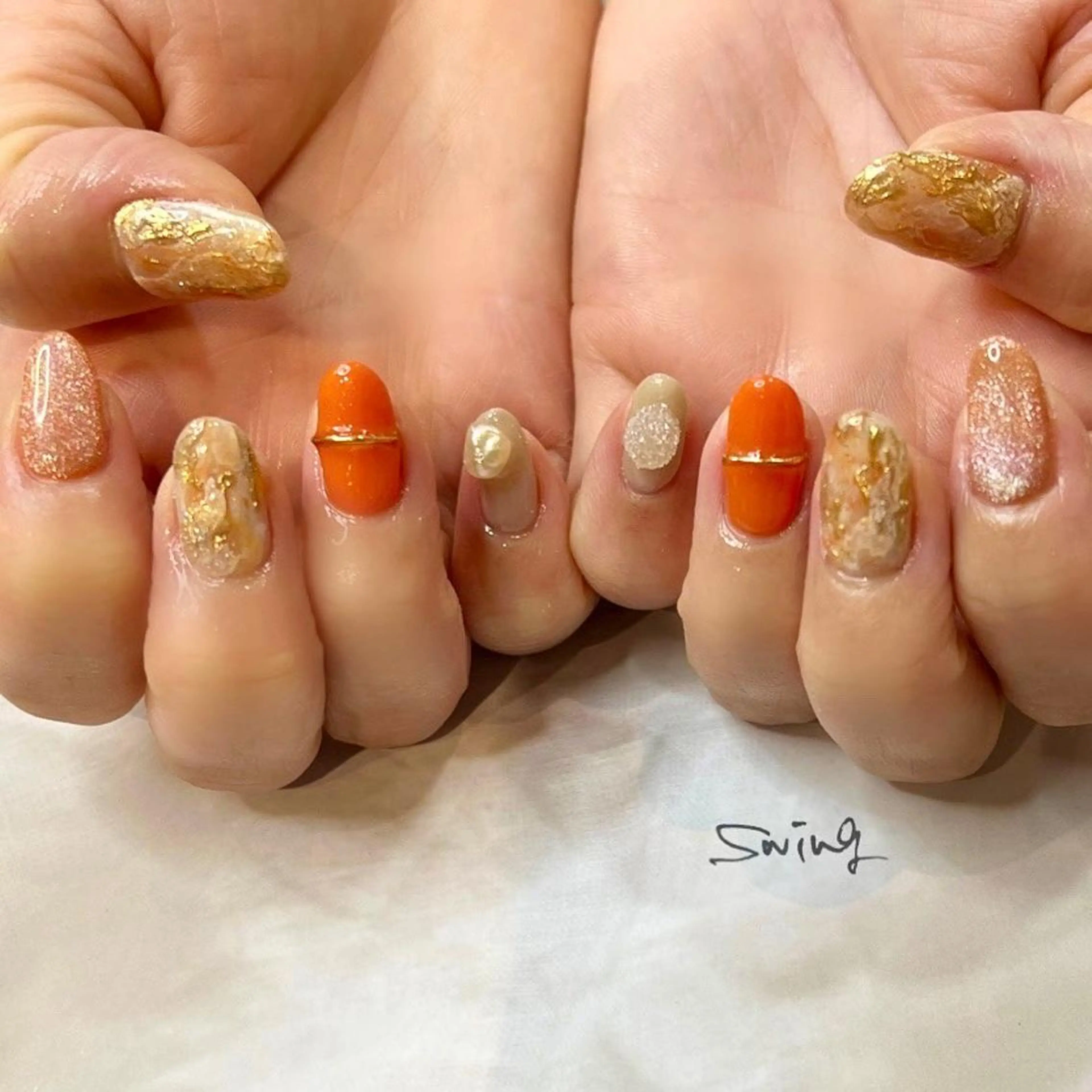 ネイル オレンジ SWING Nail Salon所属・Yoshida Takakoのネイルデザイン