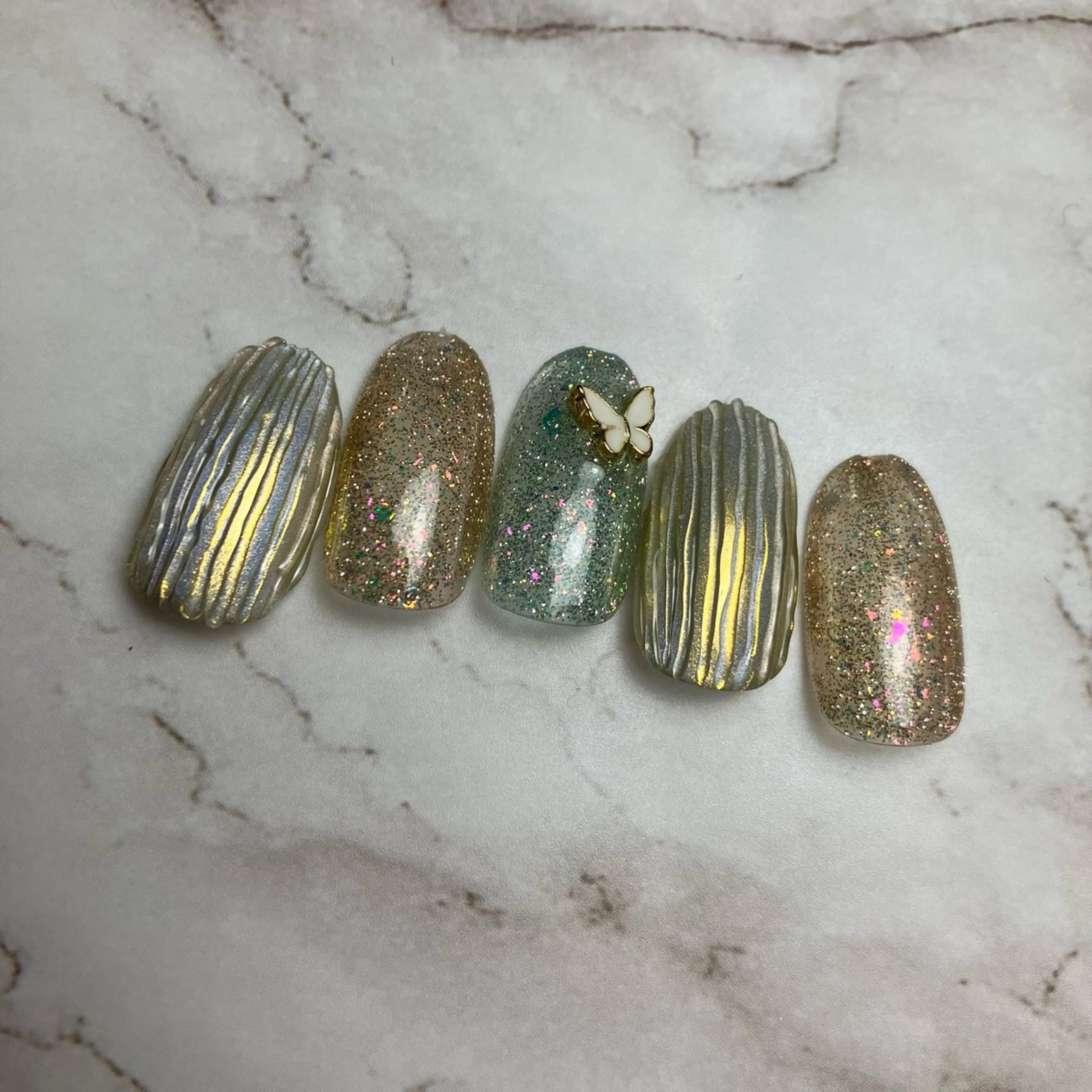 ネイル 'Olu KUMIのマツエク・マツパデザイン