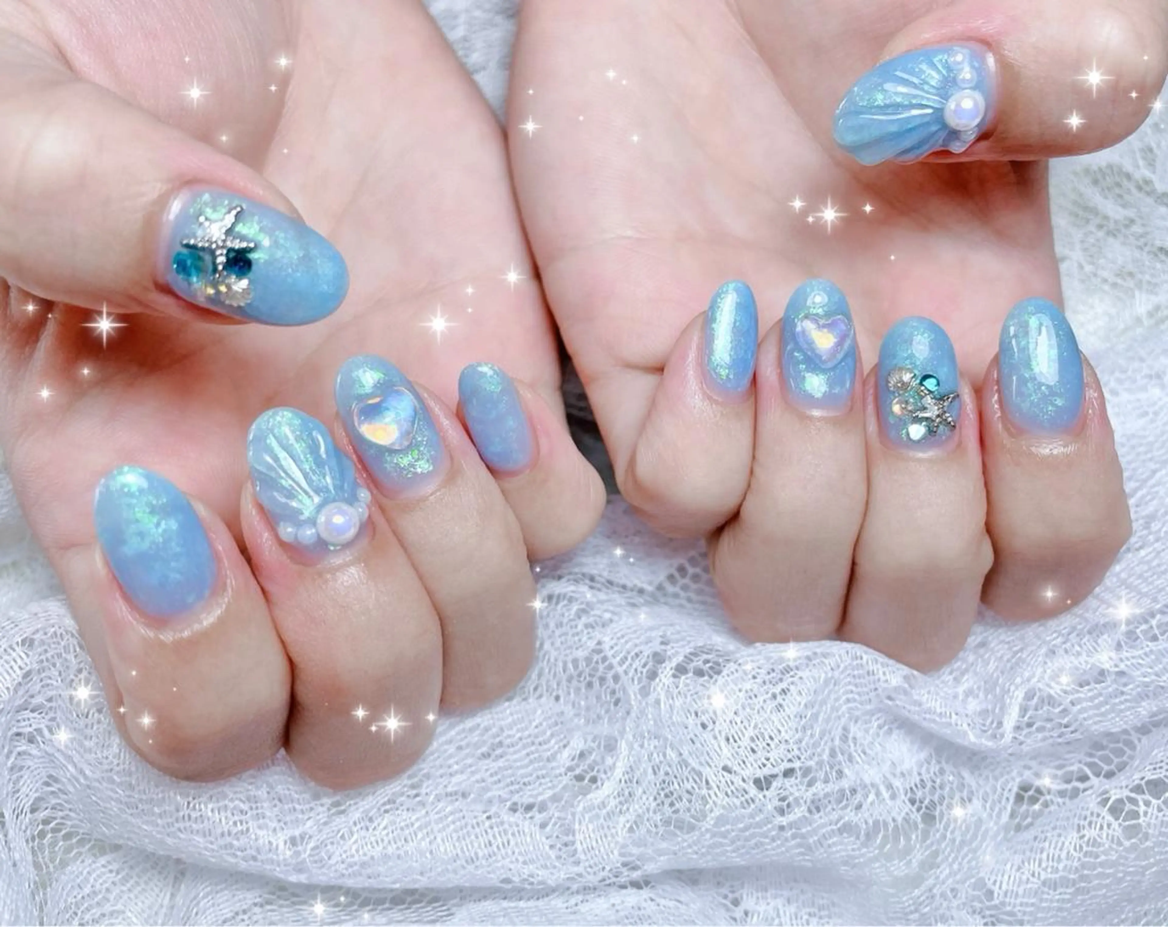 ネイル オーロラネイル ブルー 氷ネイル・うるうるネイル ハンドネイル FLARE NAIL フレアネイルのネイルデザイン