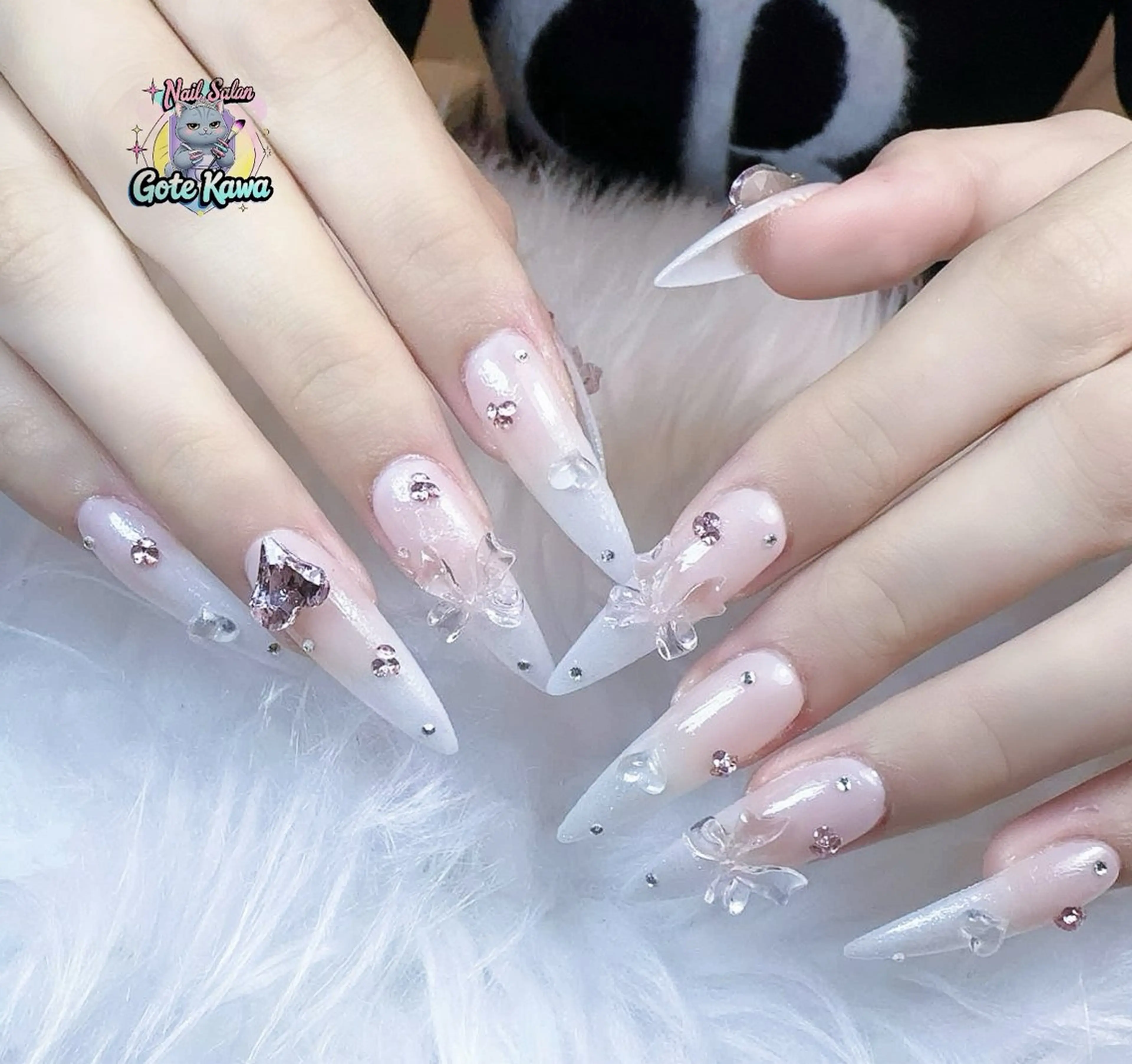 ネイル アートネイル 長さ出し キラキラネイル ピンク リボン ハンドネイル ハンドケア GOTE KAWA Nail Salon(ゴテかわ)所属・Gote Kawa nail salonのネイルデザイン