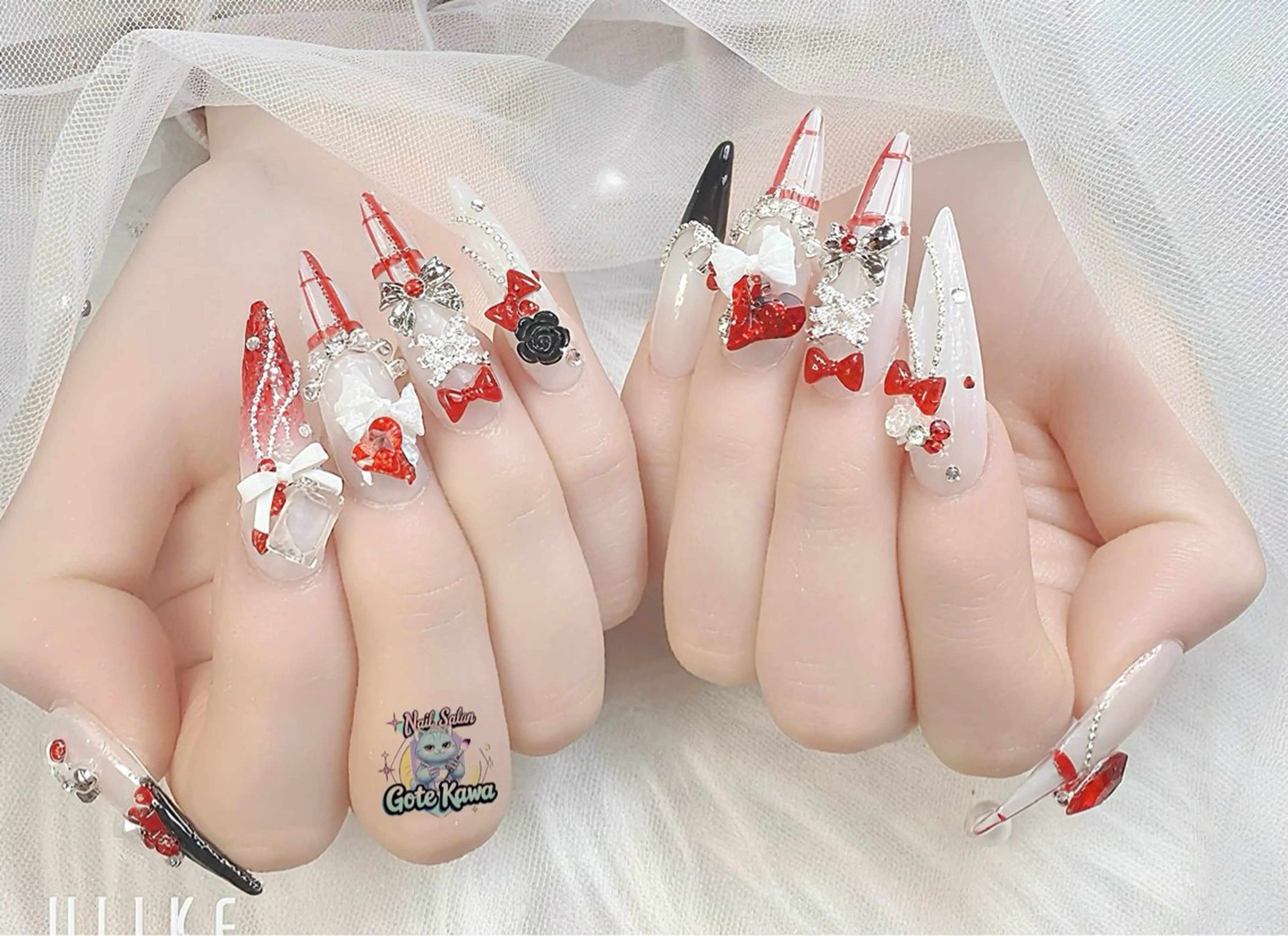 ネイル グラデーション ハート 持ち込み 赤色 リボン ハンドネイル ハンドケア GOTE KAWA Nail Salon(ゴテかわ)所属・Gote Kawa nail salonのネイルデザイン